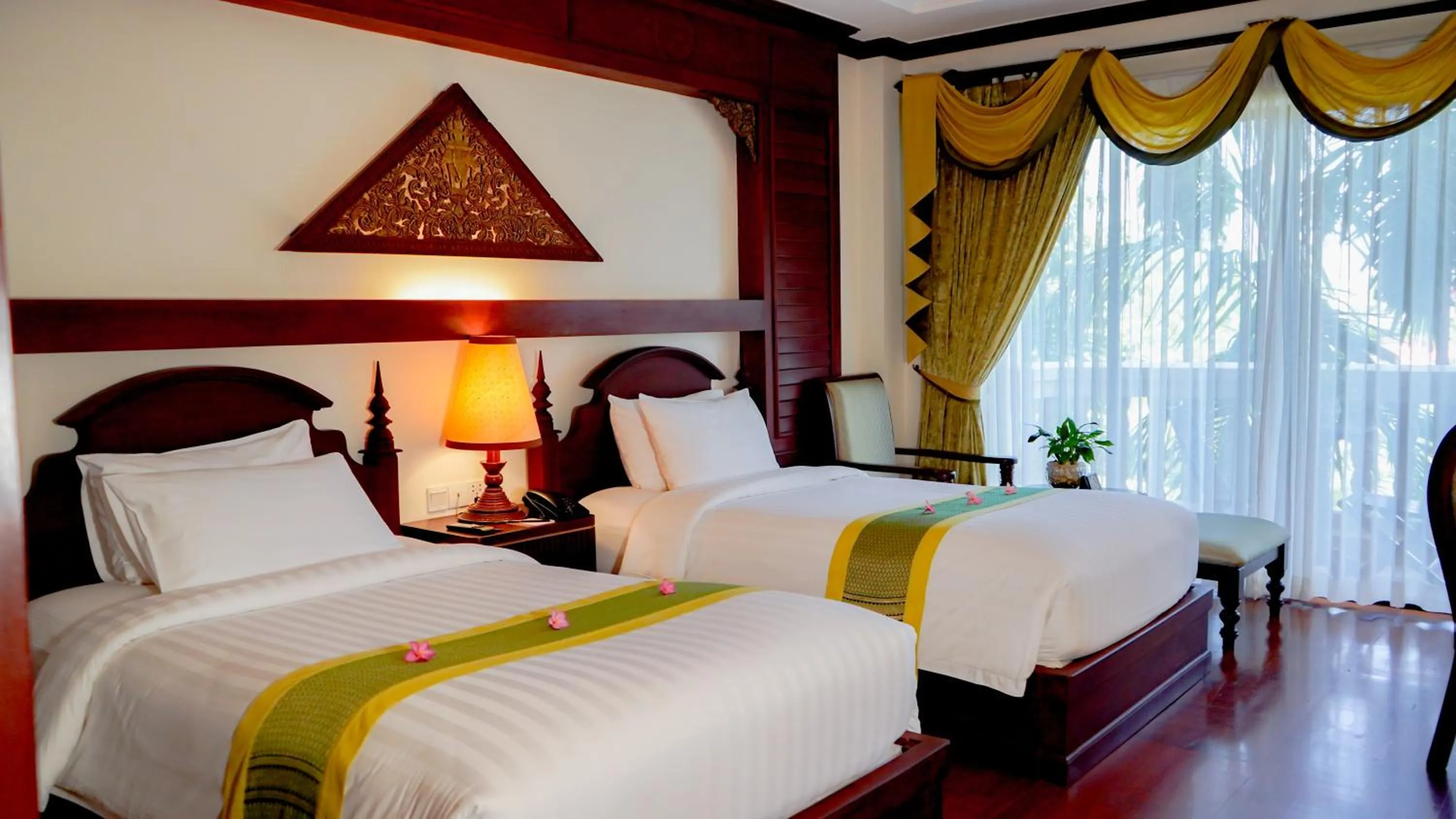 Bed in Borei Angkor Resort & Spa
