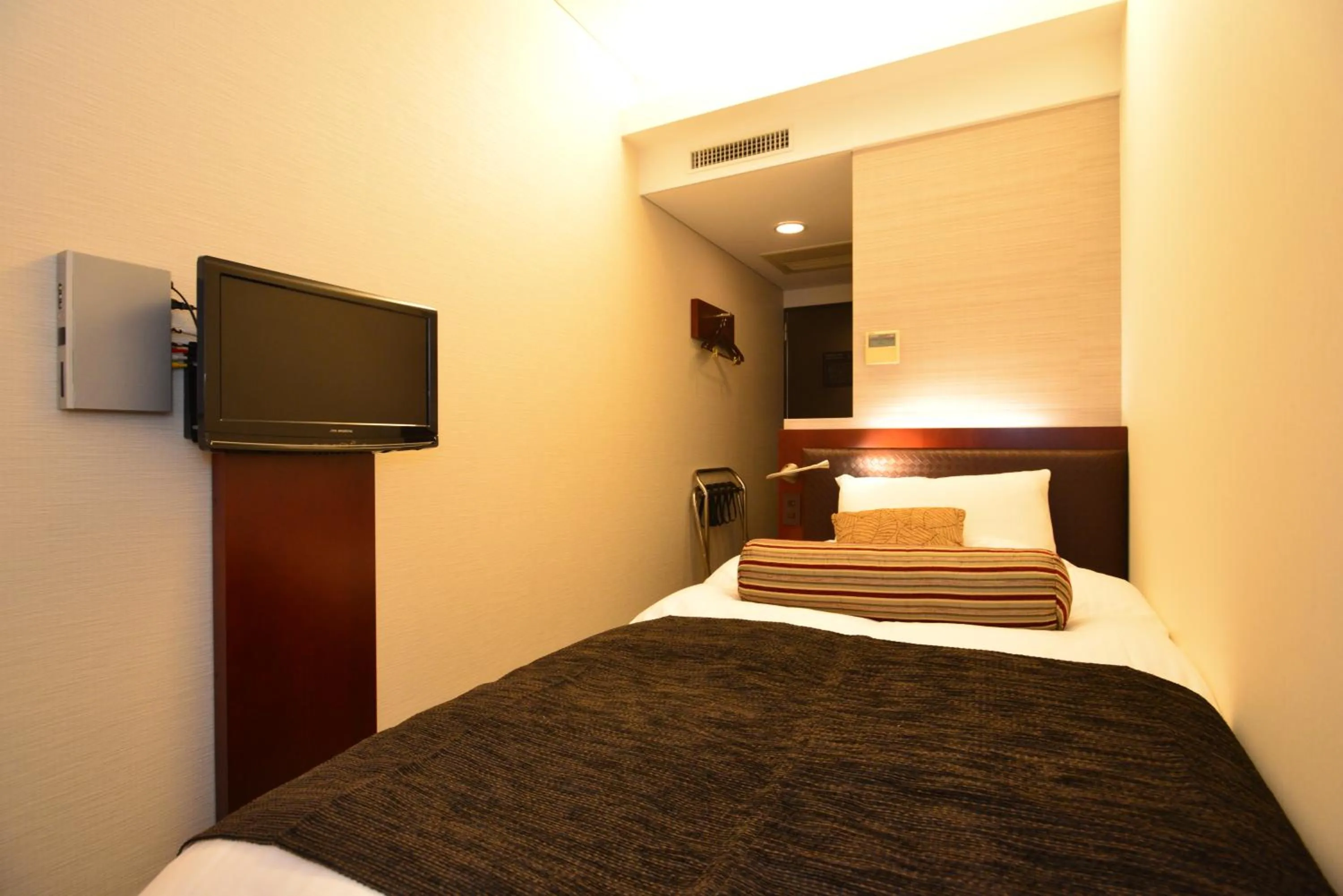 Bed in Yamato Kashihara City Hotel