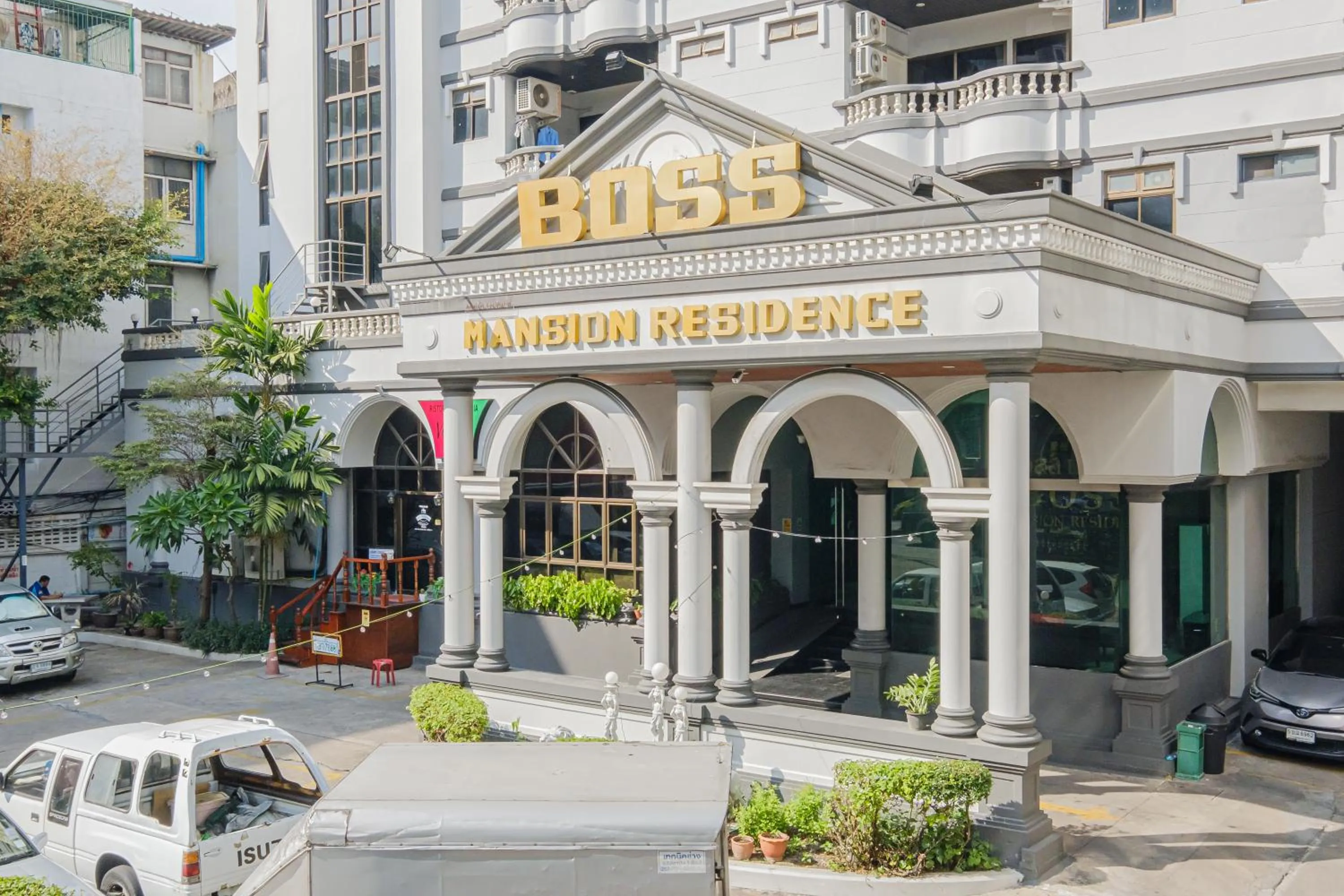 Property logo or sign in Boss Mansion