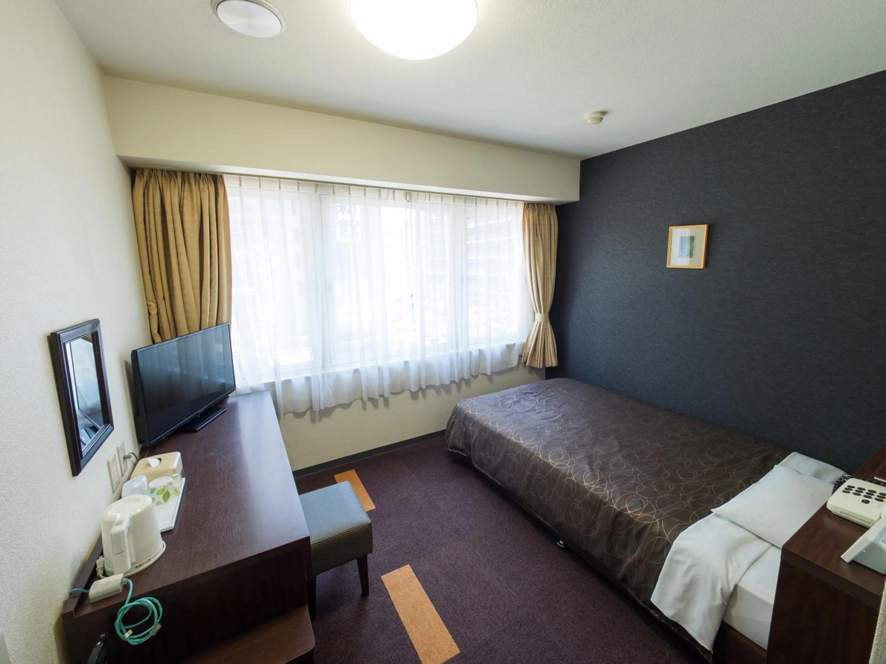 Photo of the whole room, Bed in Hotel Shin Osaka