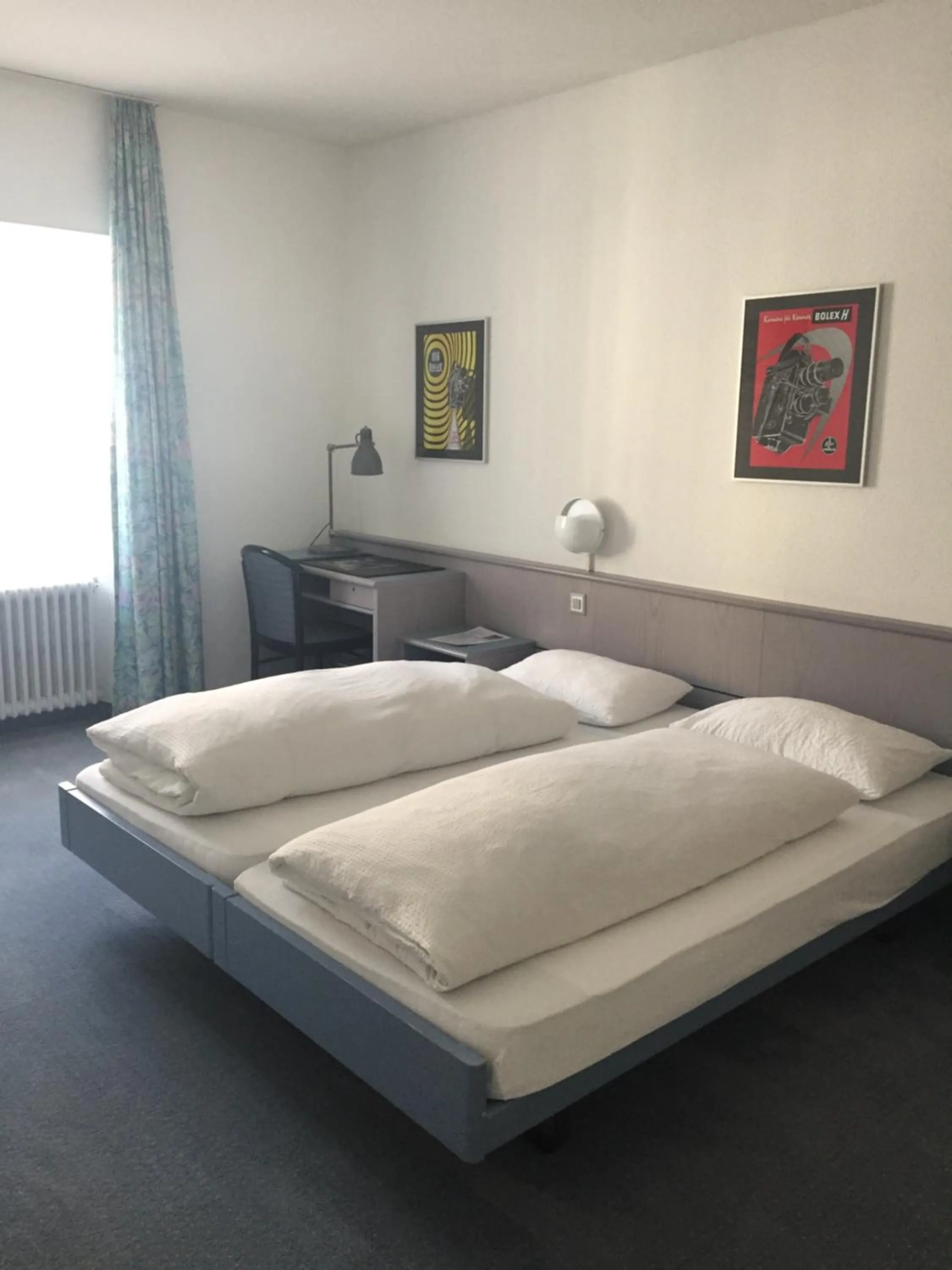 Photo of the whole room, Bed in Hôtel de France