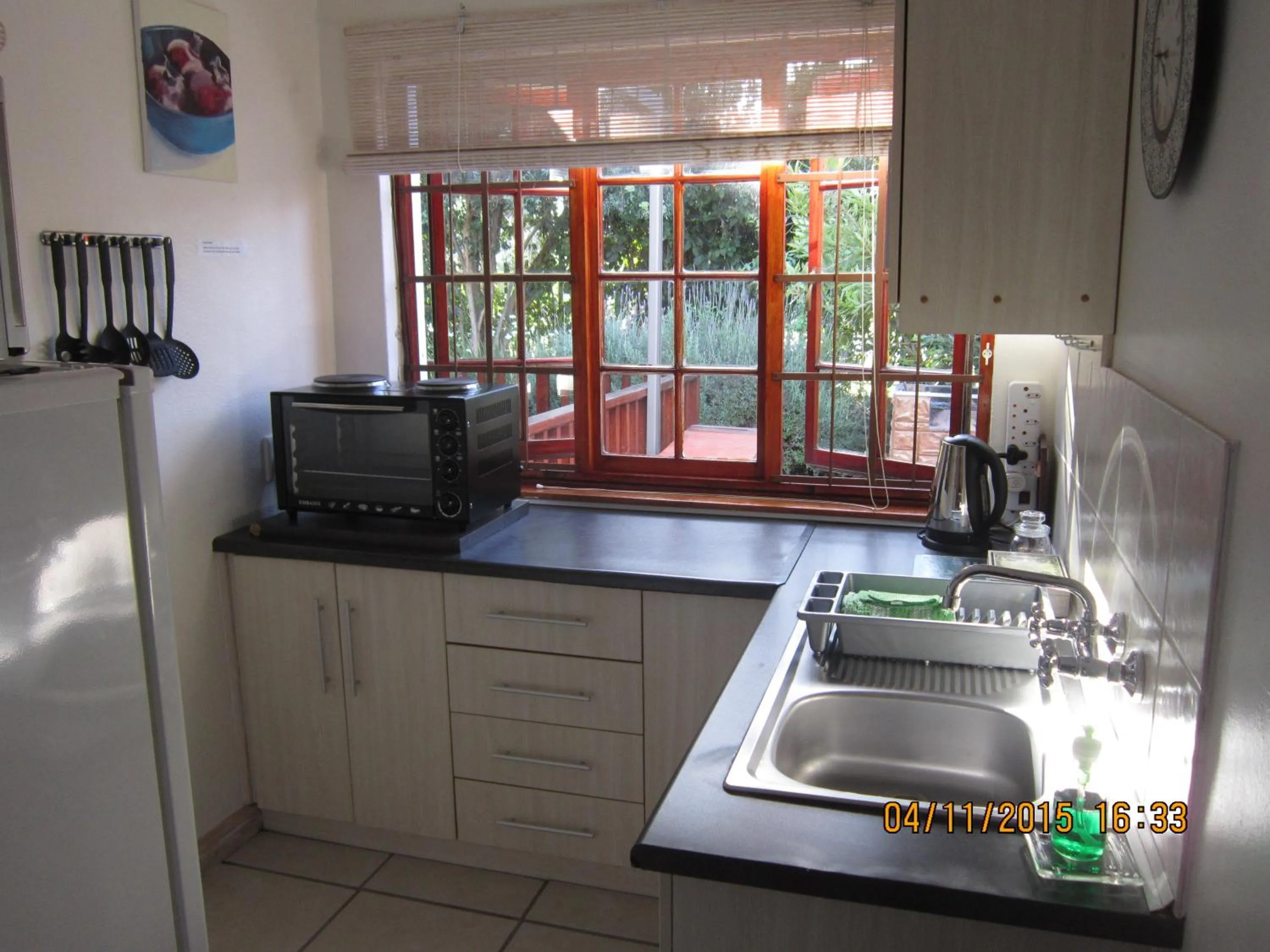 Kitchen or kitchenette in Twilight Cottage