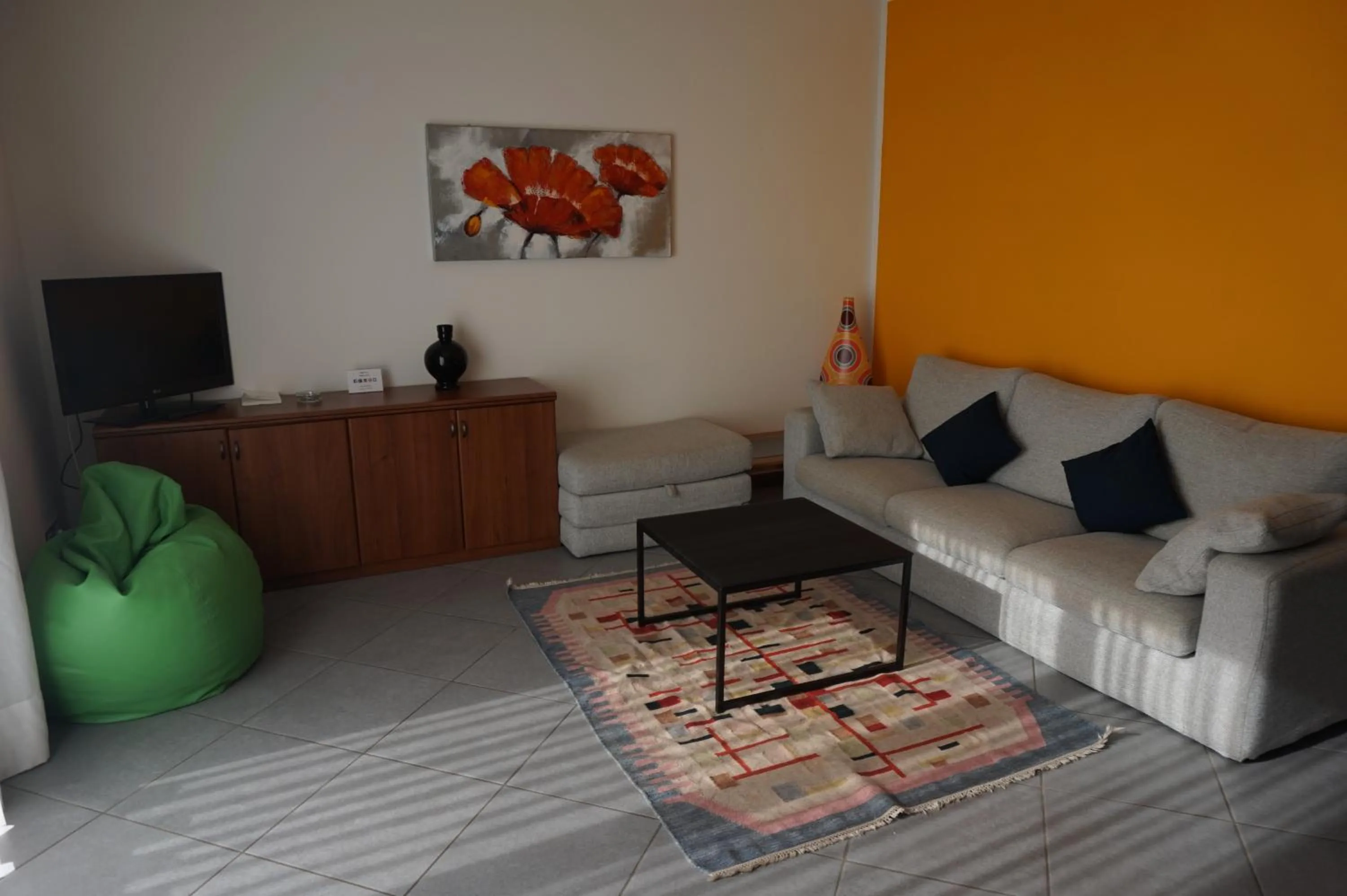 Living room in Residence Rivachiara (check-in at Hotel Riviera in Viale Rovereto, 95)