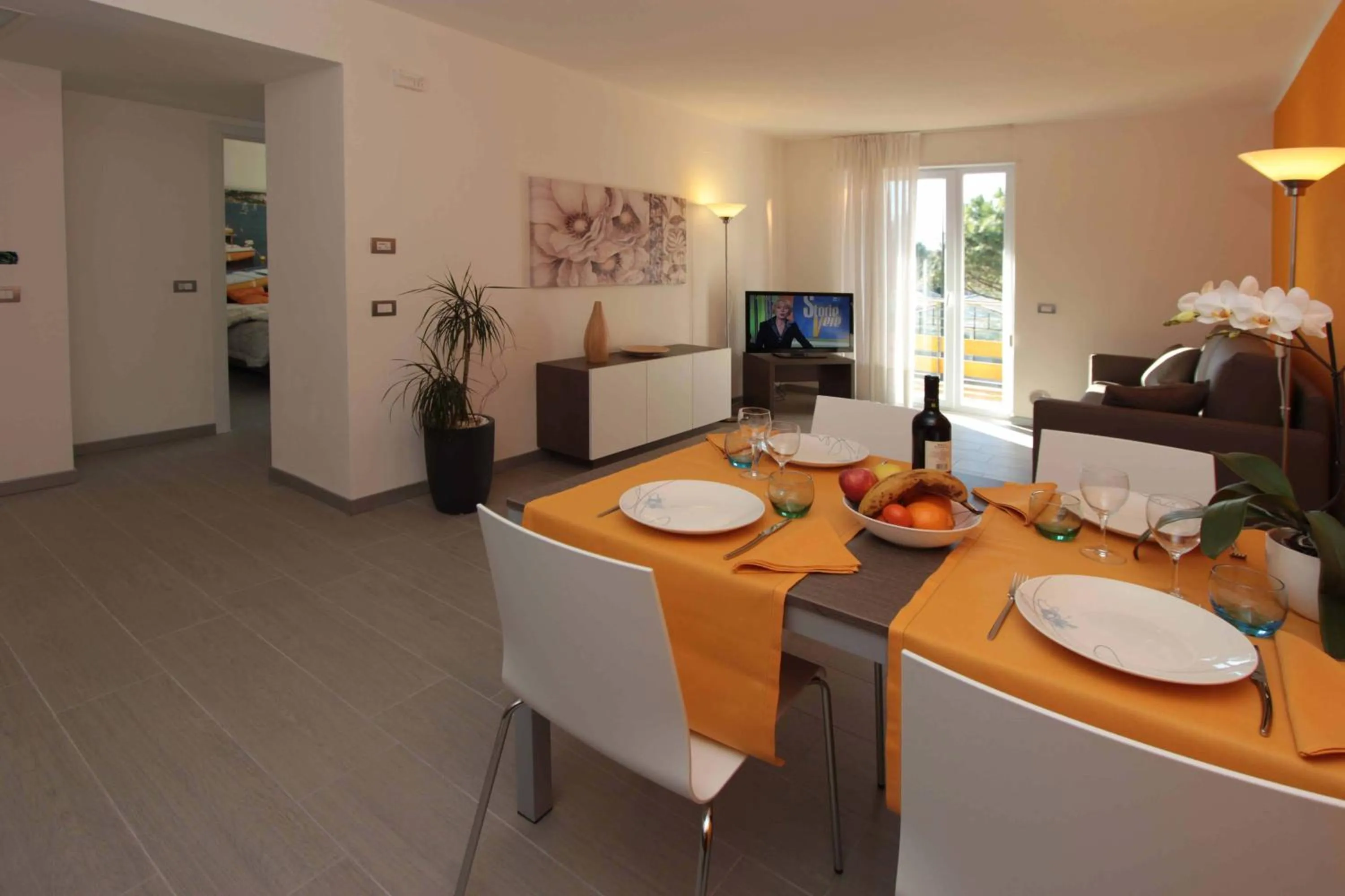 Living room in Residence Rivachiara (check-in at Hotel Riviera in Viale Rovereto, 95)