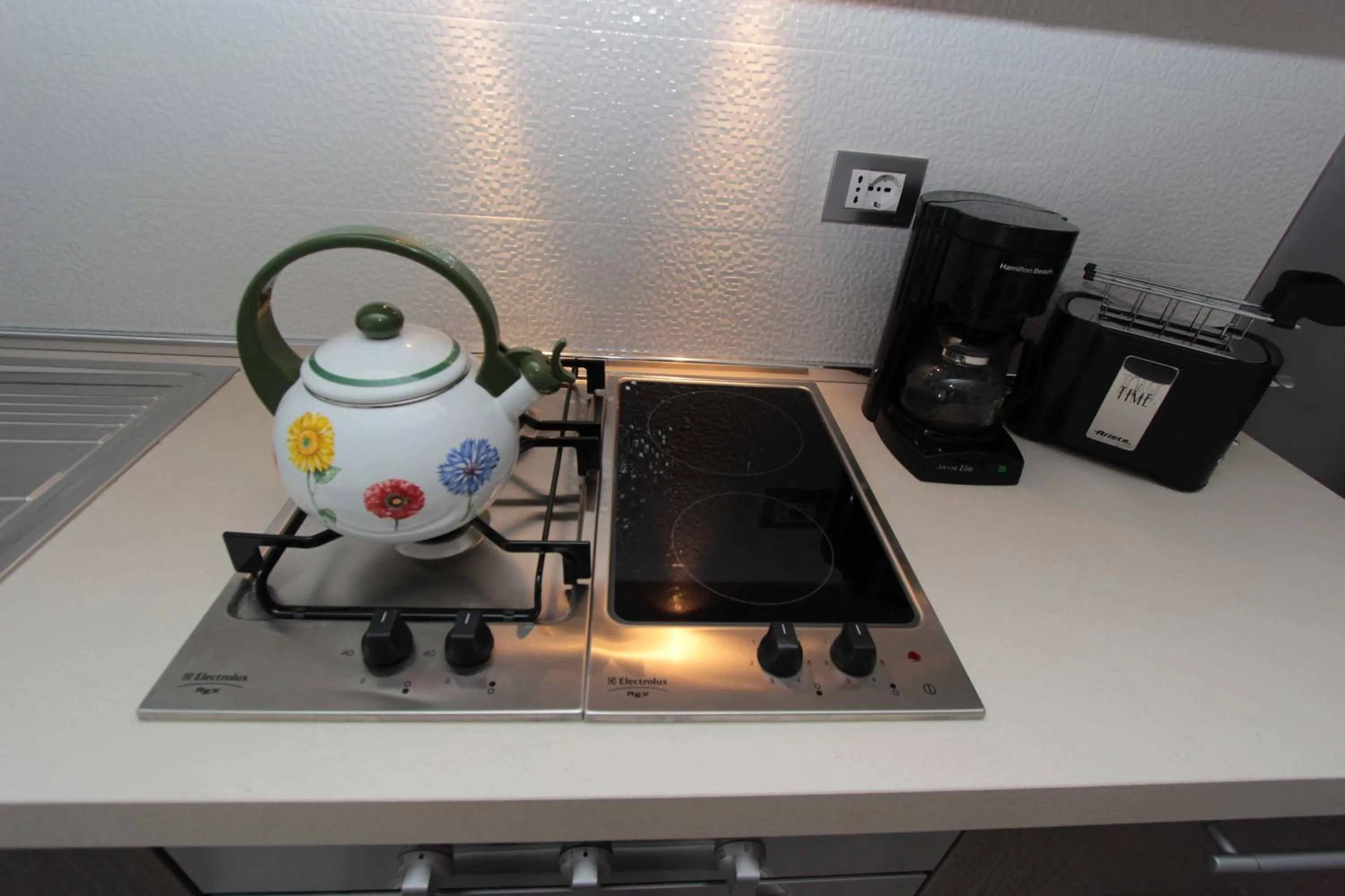 Kitchen or kitchenette in Residence Rivachiara (check-in at Hotel Riviera in Viale Rovereto, 95)