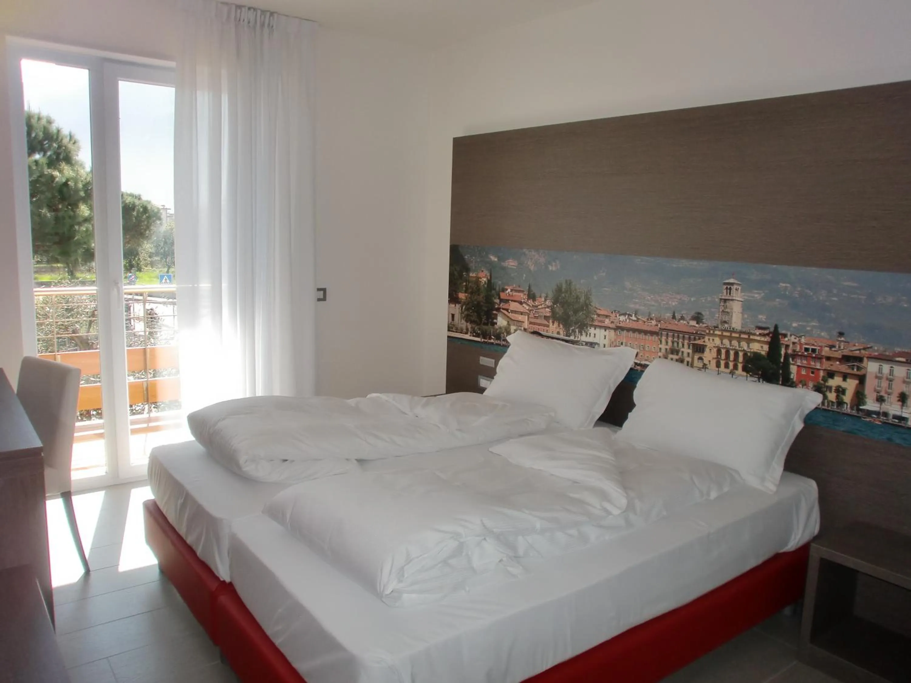 Bed in Residence Rivachiara (check-in at Hotel Riviera in Viale Rovereto, 95)