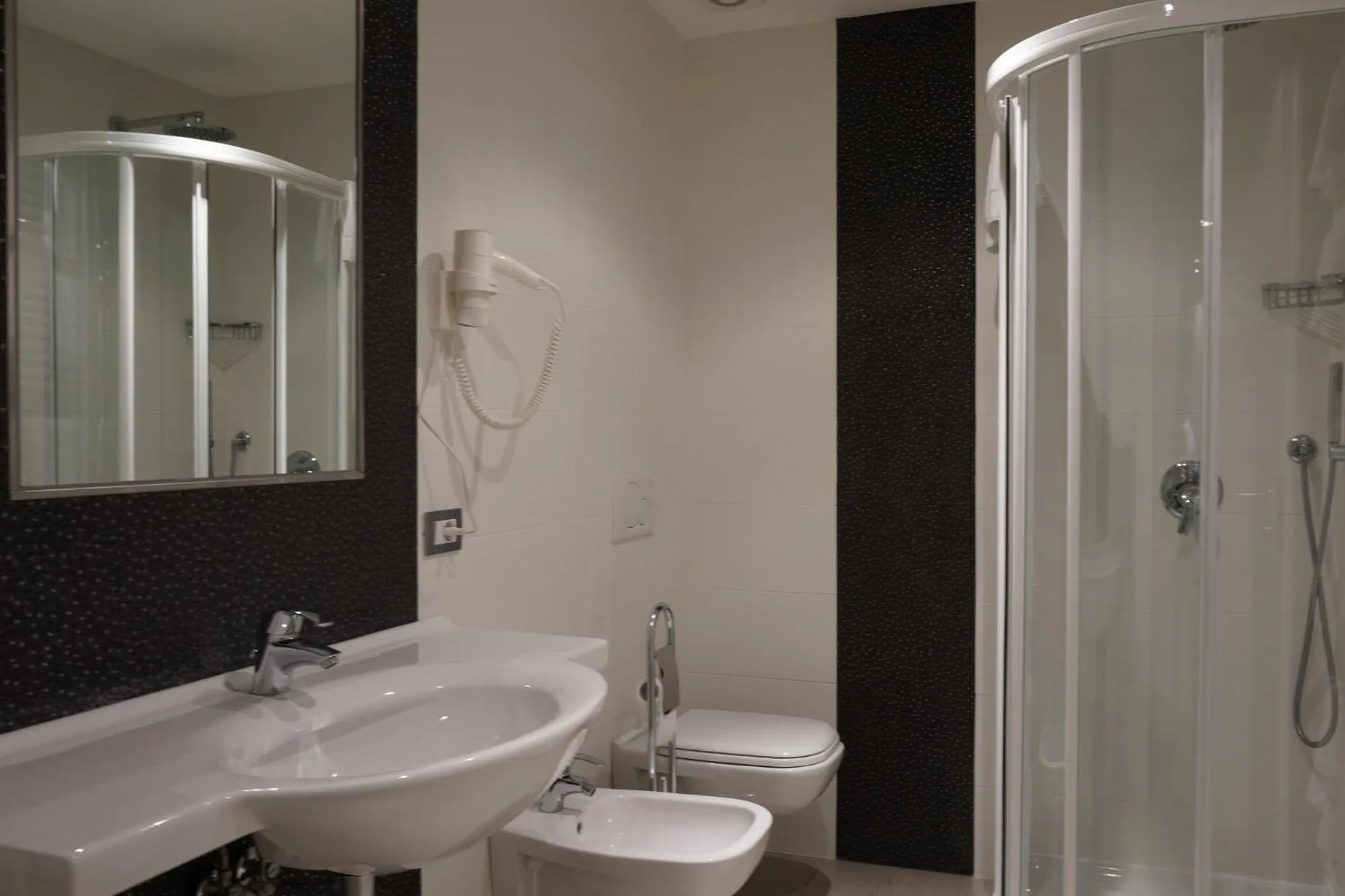 Bathroom in Residence Rivachiara (check-in at Hotel Riviera in Viale Rovereto, 95)