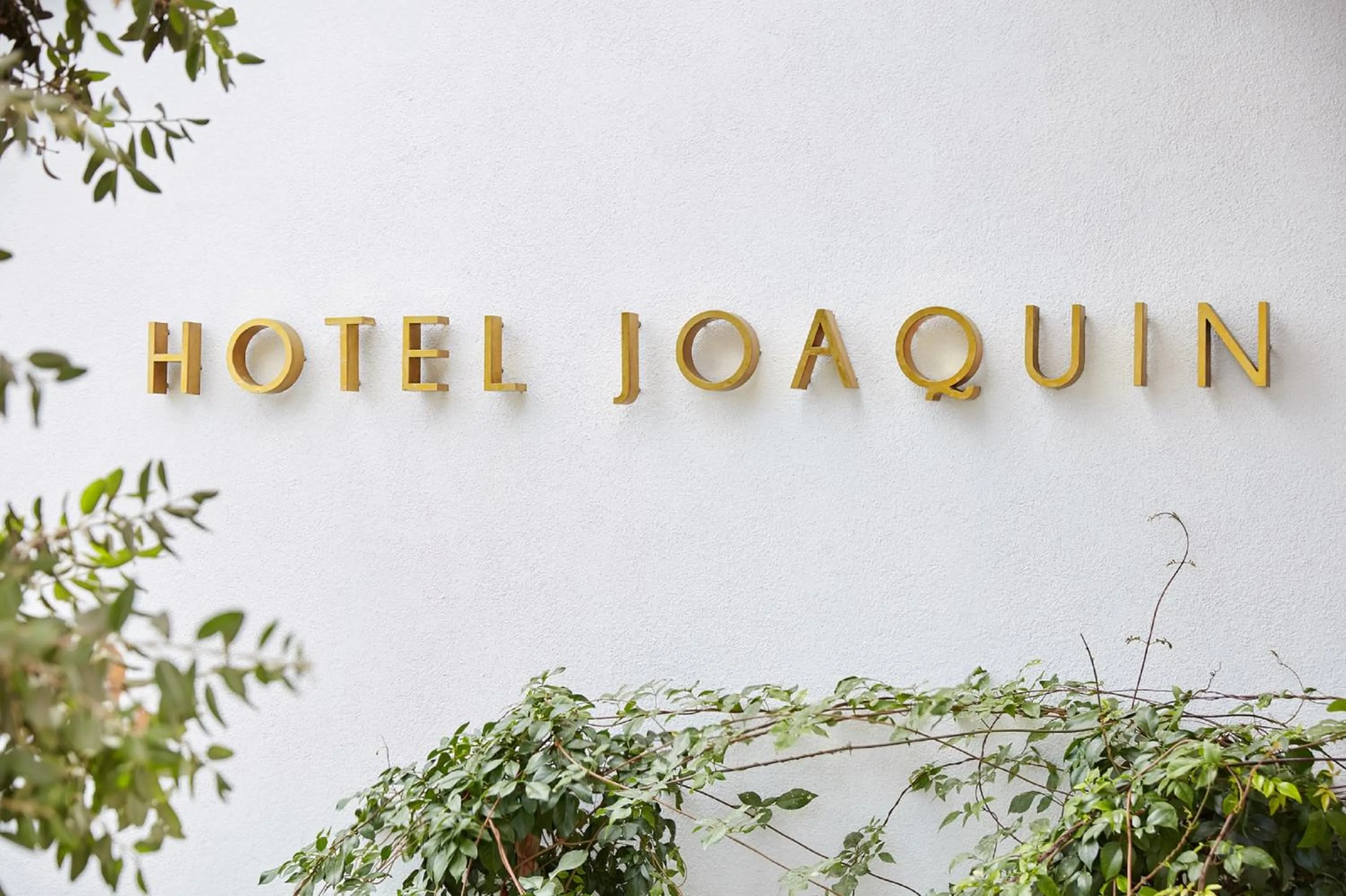 Property logo or sign in Hotel Joaquin