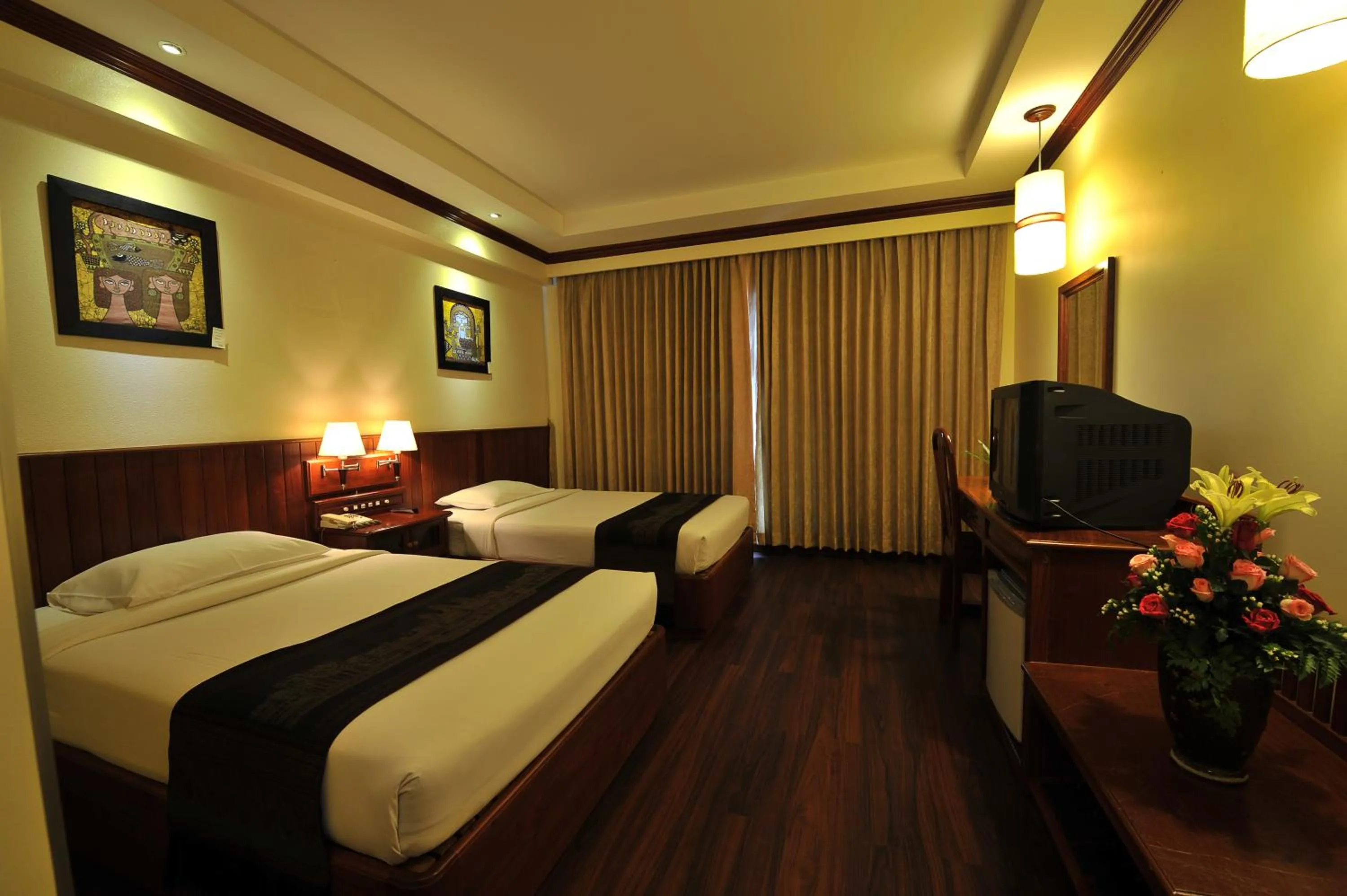 Bed in City River Hotel