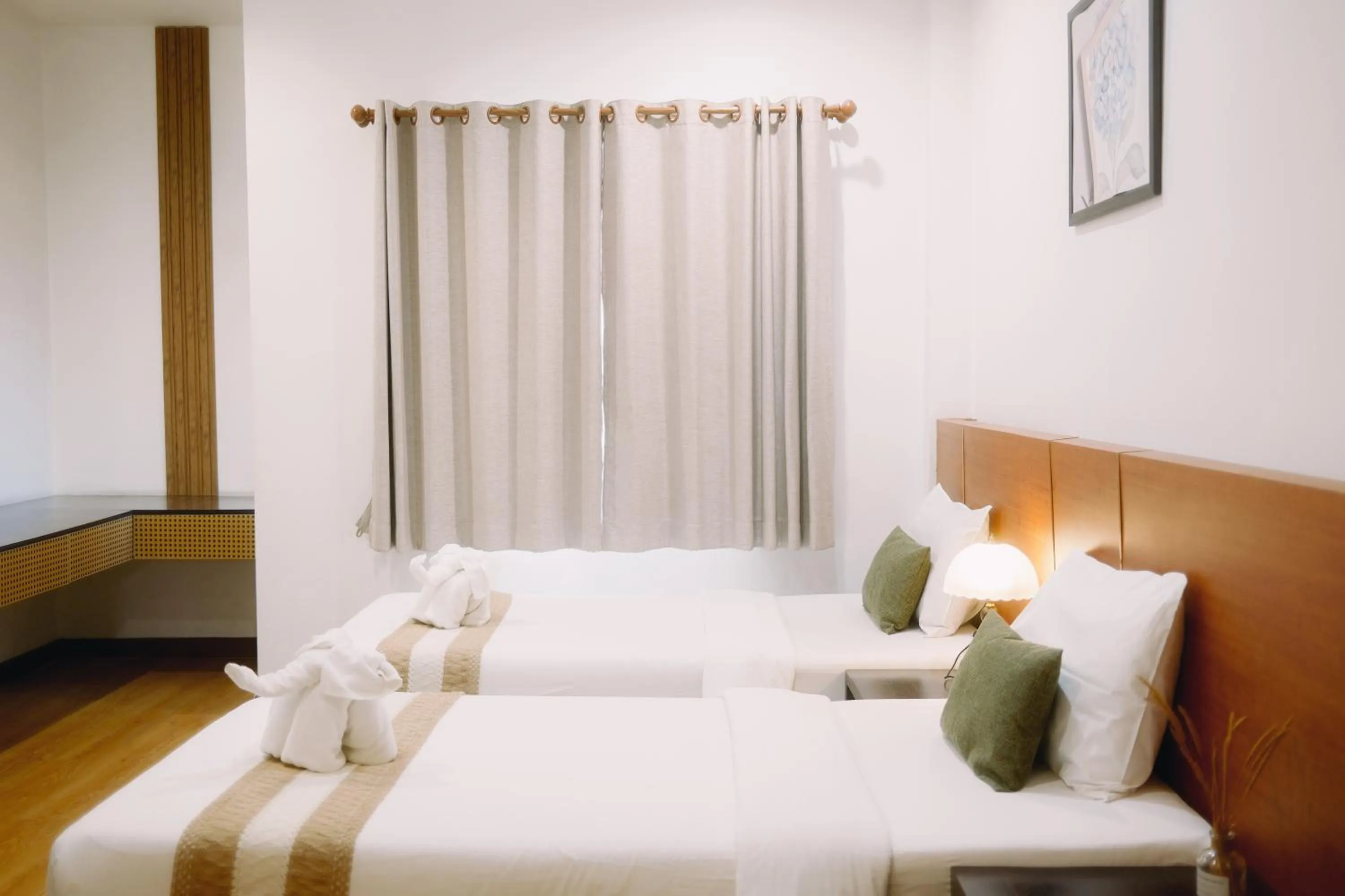 Bed in La Burie Gallery Hotel