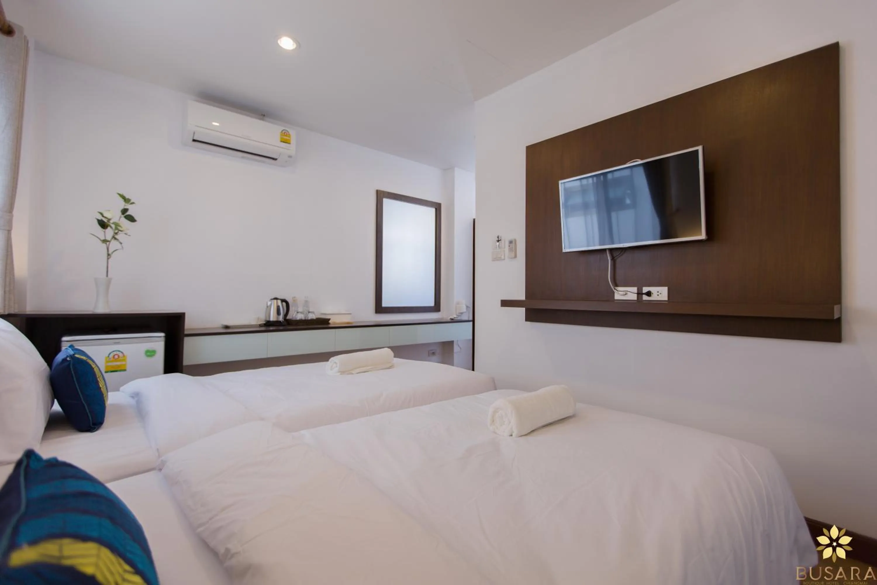 Bed in Busara Hotel Chiangmai