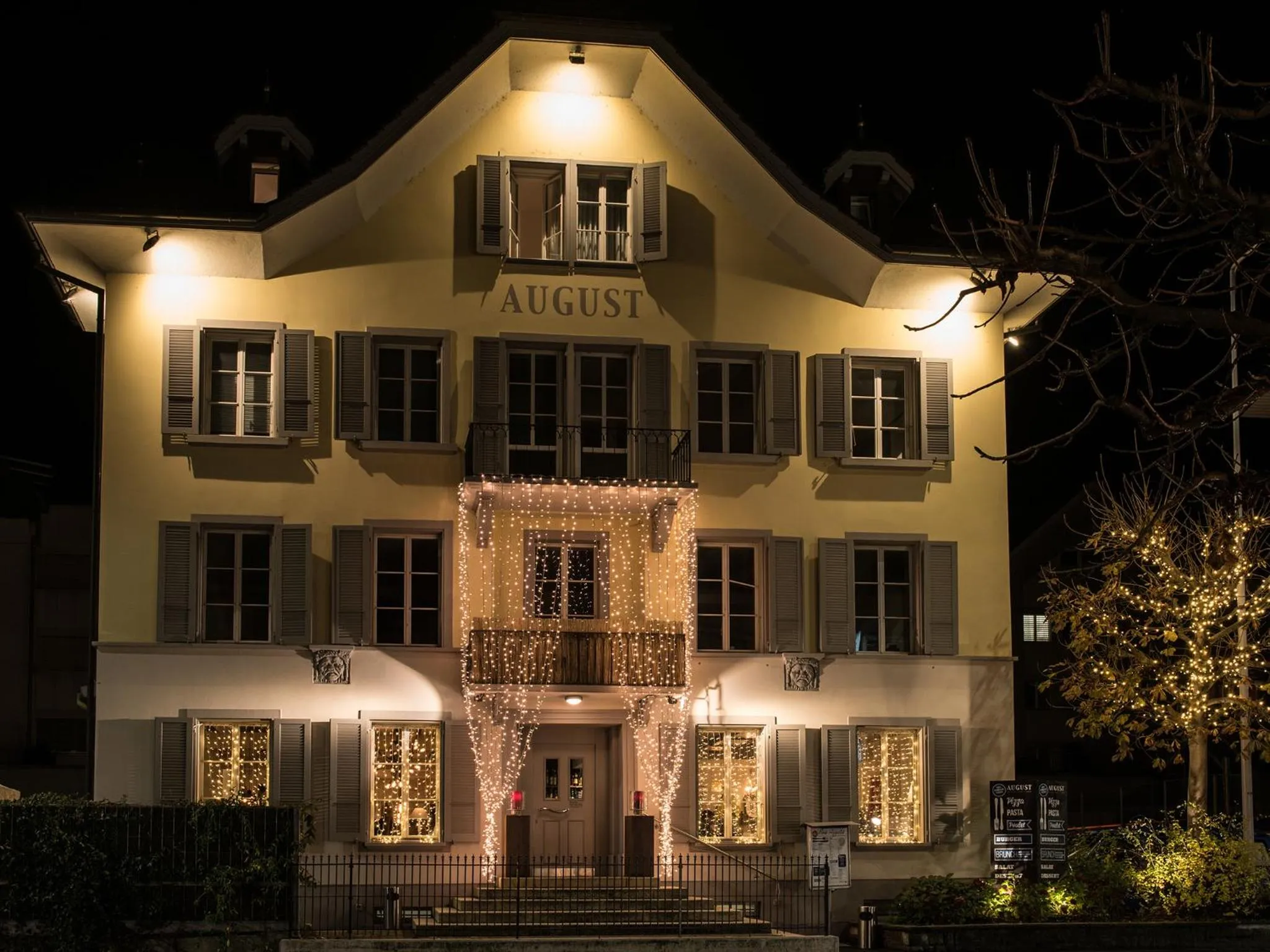 Facade/entrance in August Restaurant Hotel