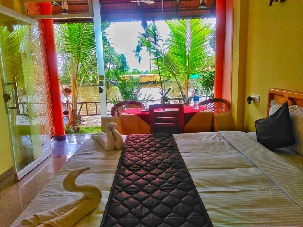 Bed in The Lake Paradise Boutique Resort