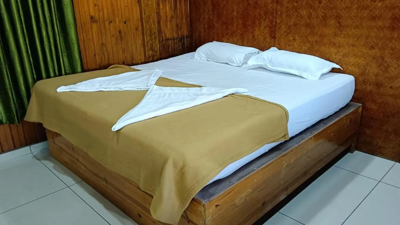 Bed in The Lake Paradise Boutique Resort