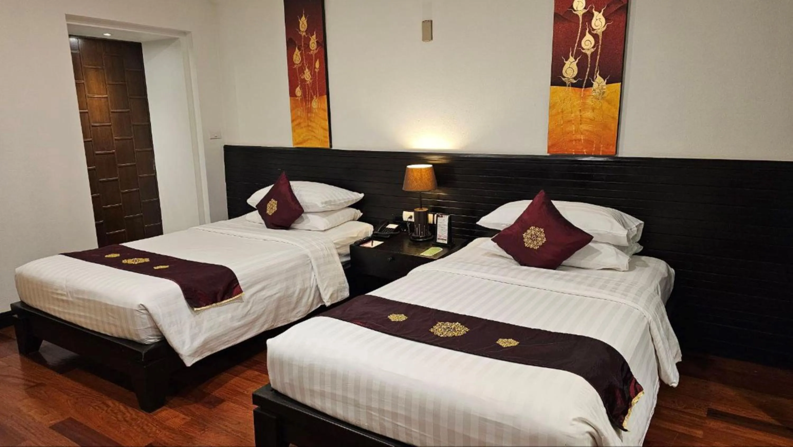 Bed in Tara Angkor Hotel