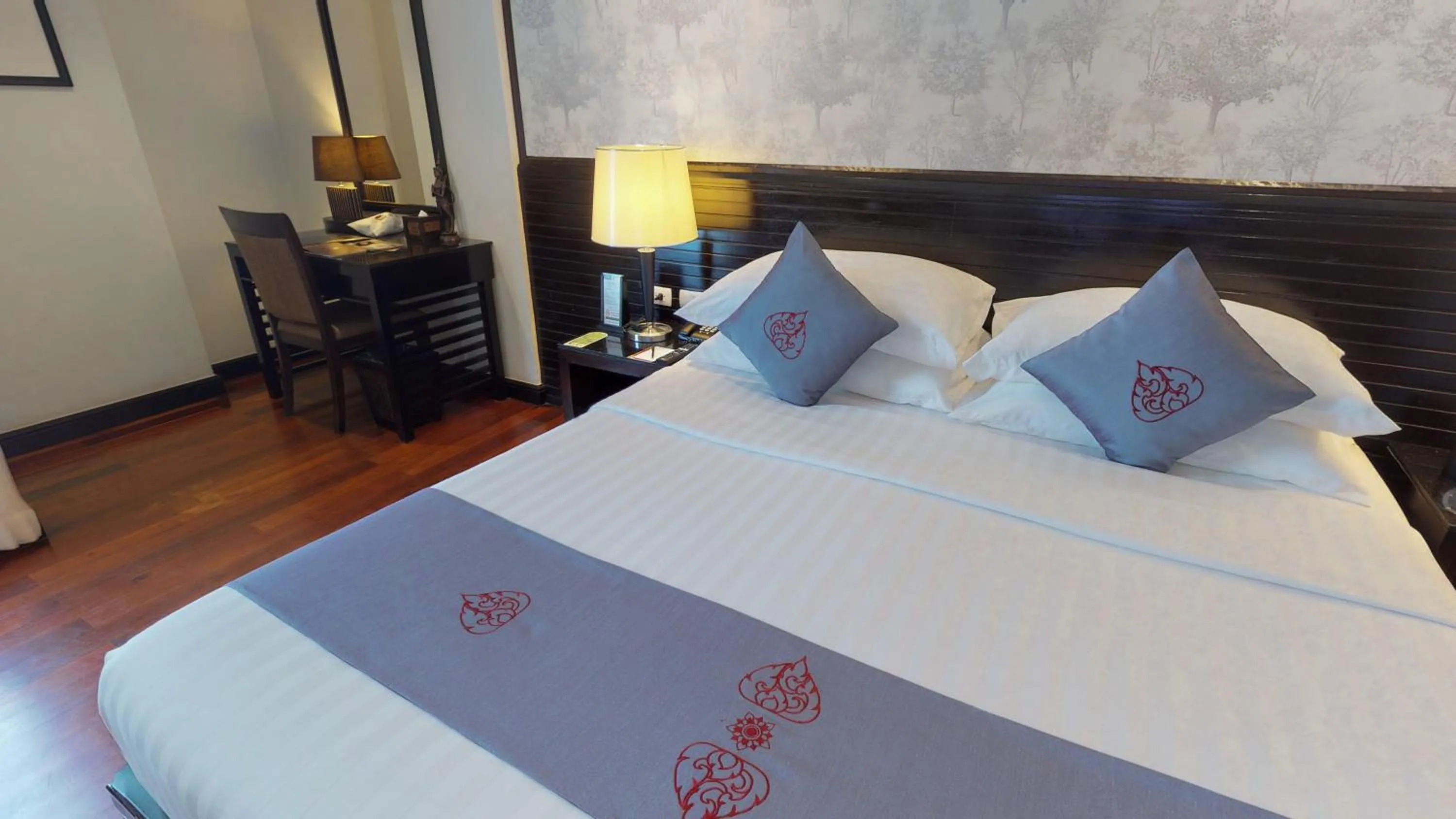 Bed in Tara Angkor Hotel