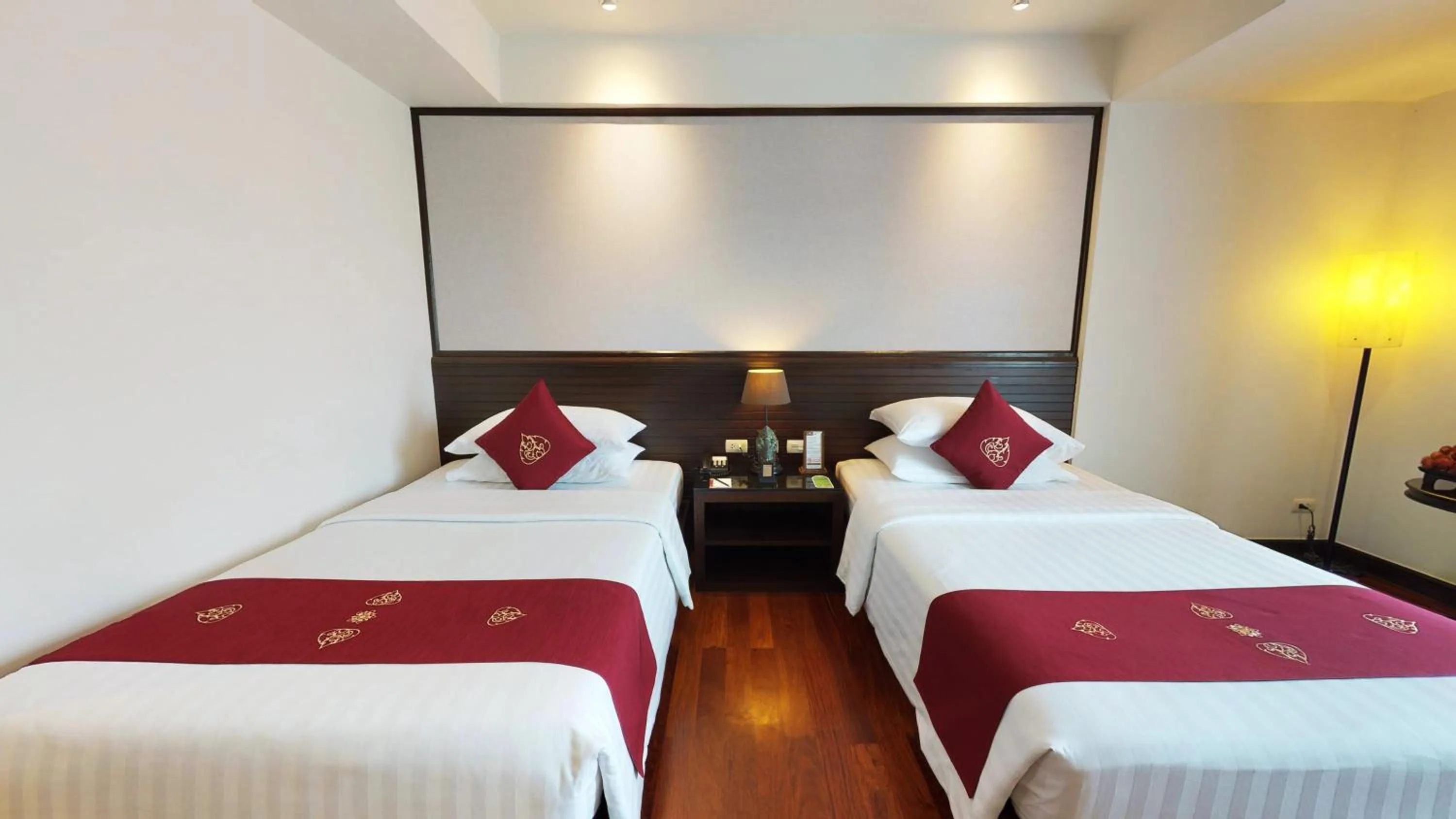 Bed in Tara Angkor Hotel