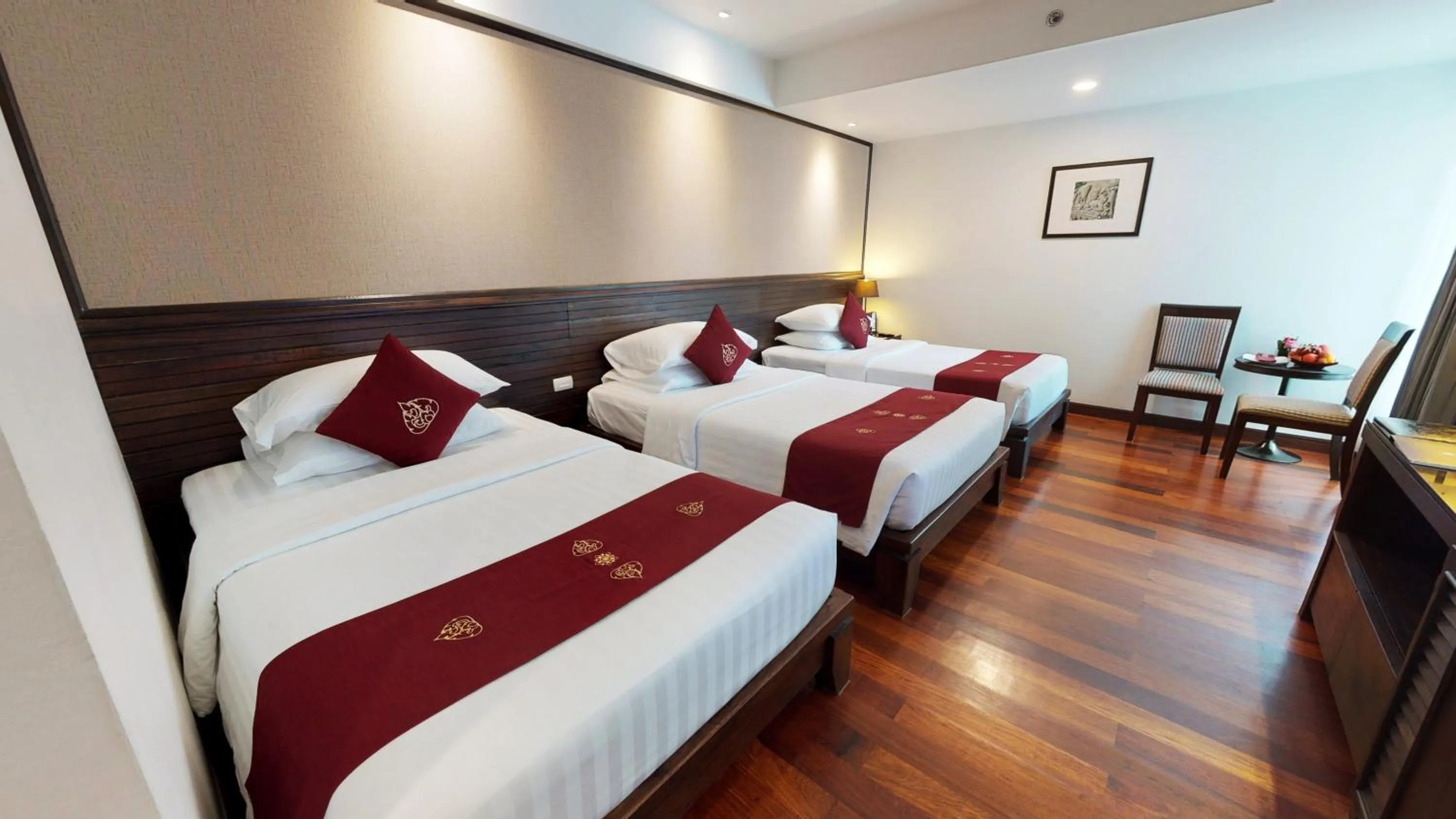 Bed in Tara Angkor Hotel