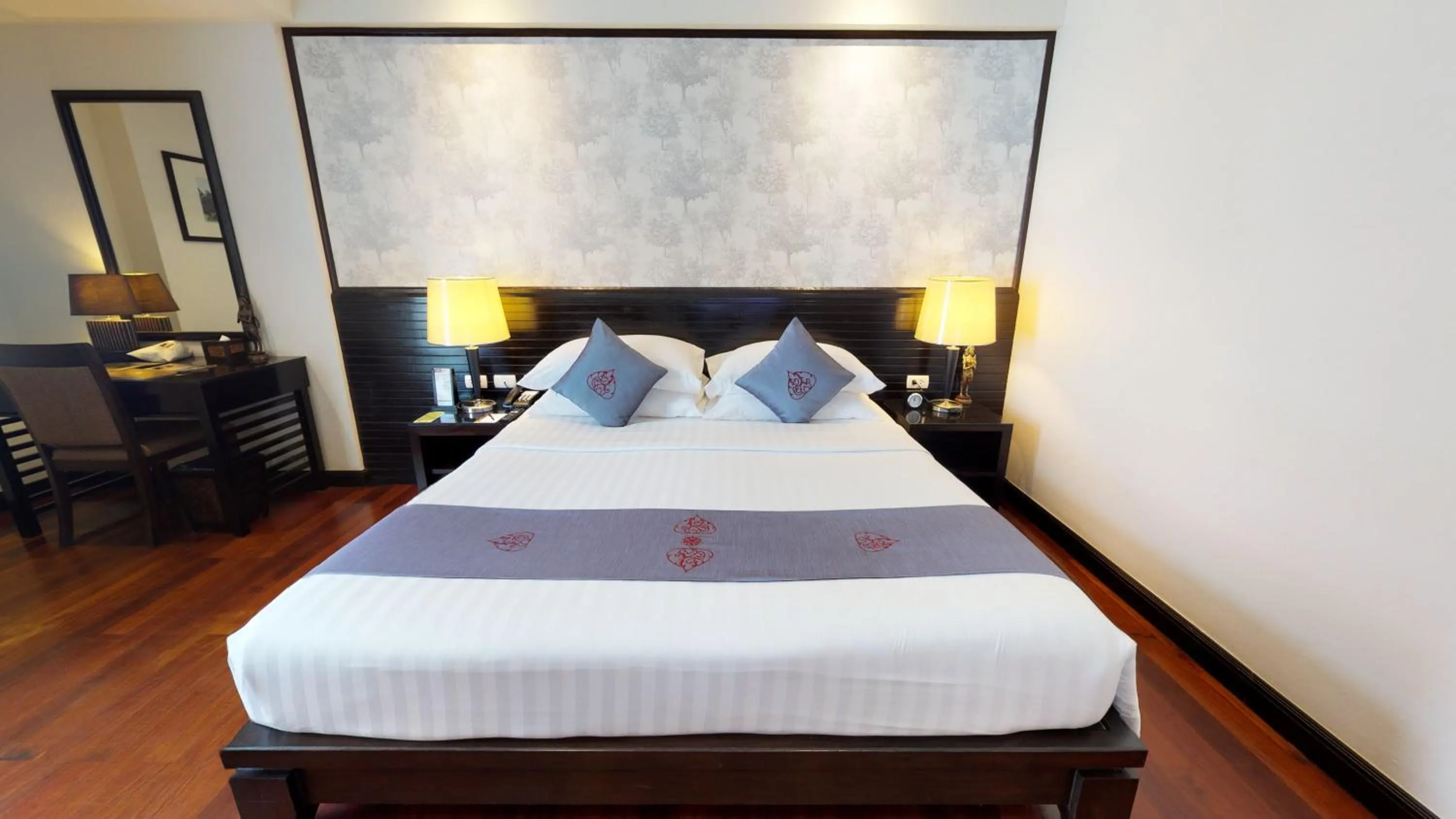 Bed in Tara Angkor Hotel