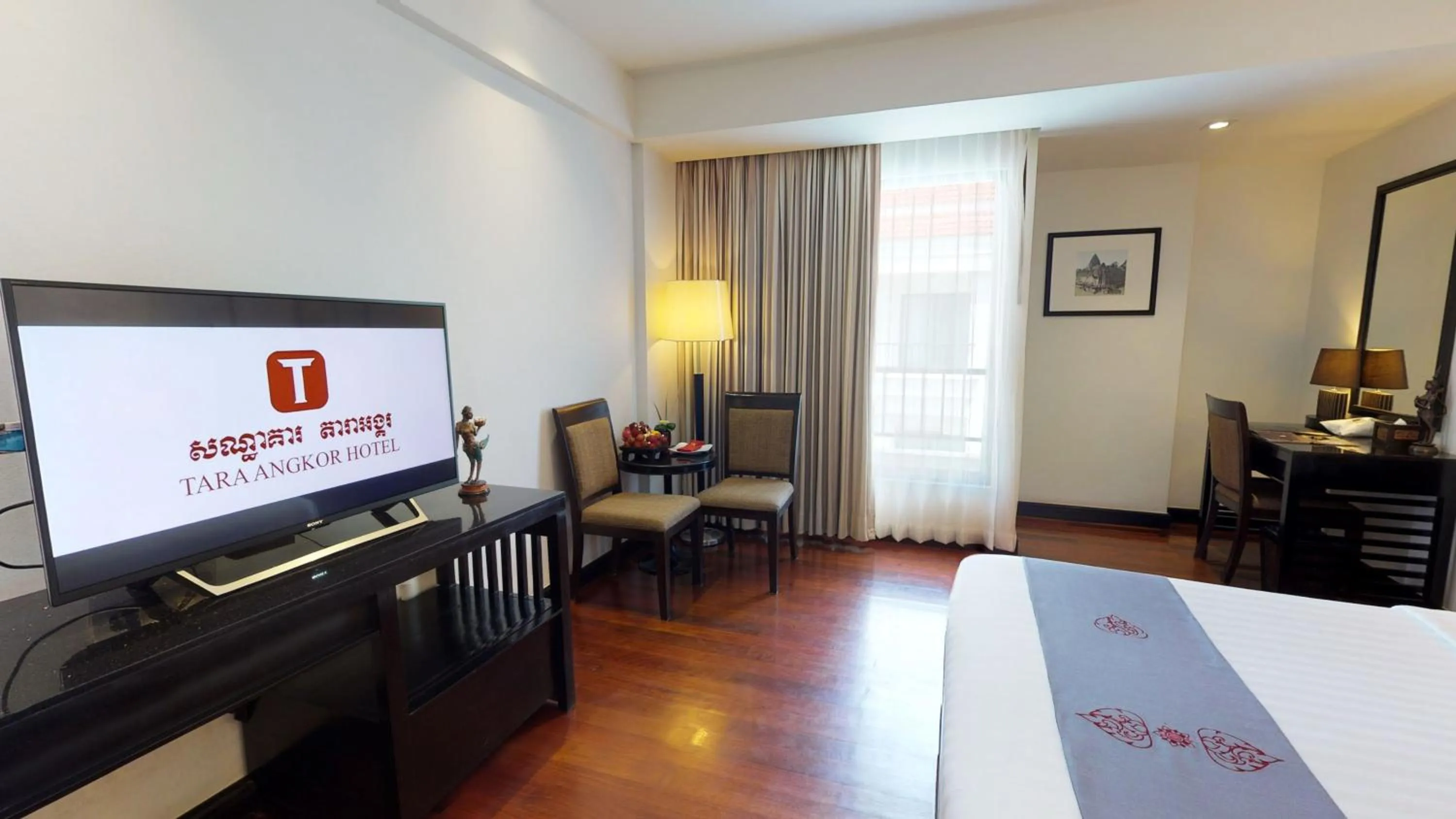 TV and multimedia, Bed in Tara Angkor Hotel