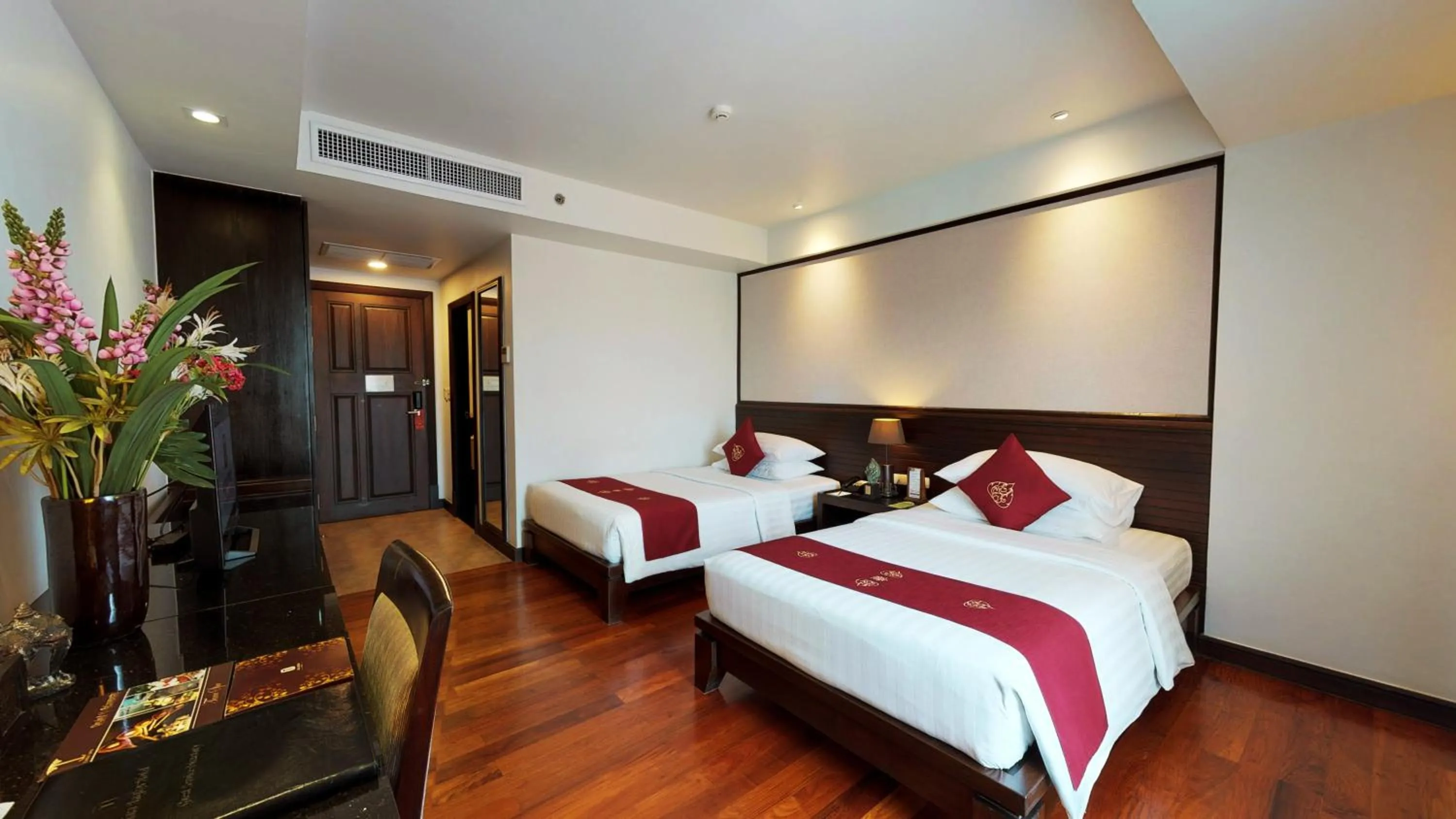 Bed in Tara Angkor Hotel