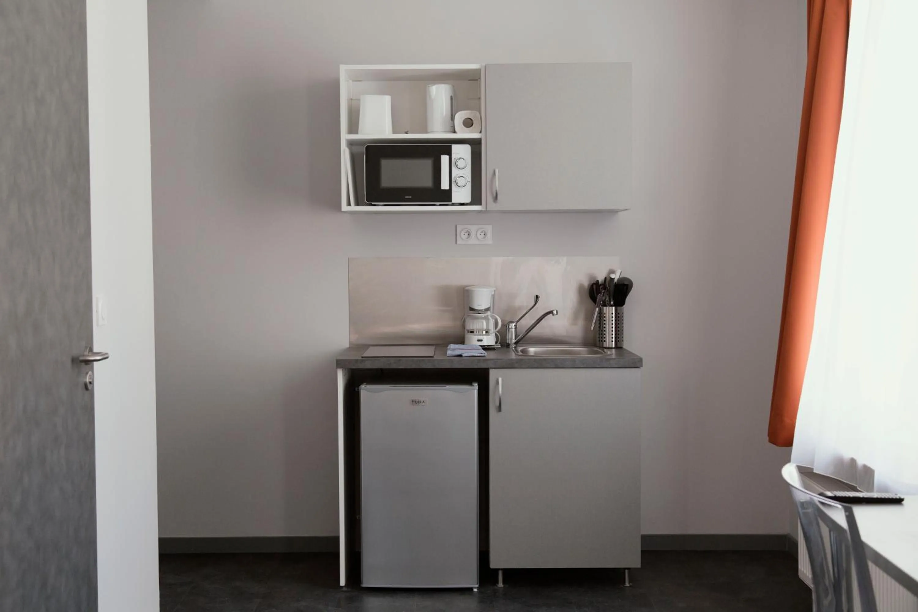 Kitchen or kitchenette in SmartAppart Saint Nazaire