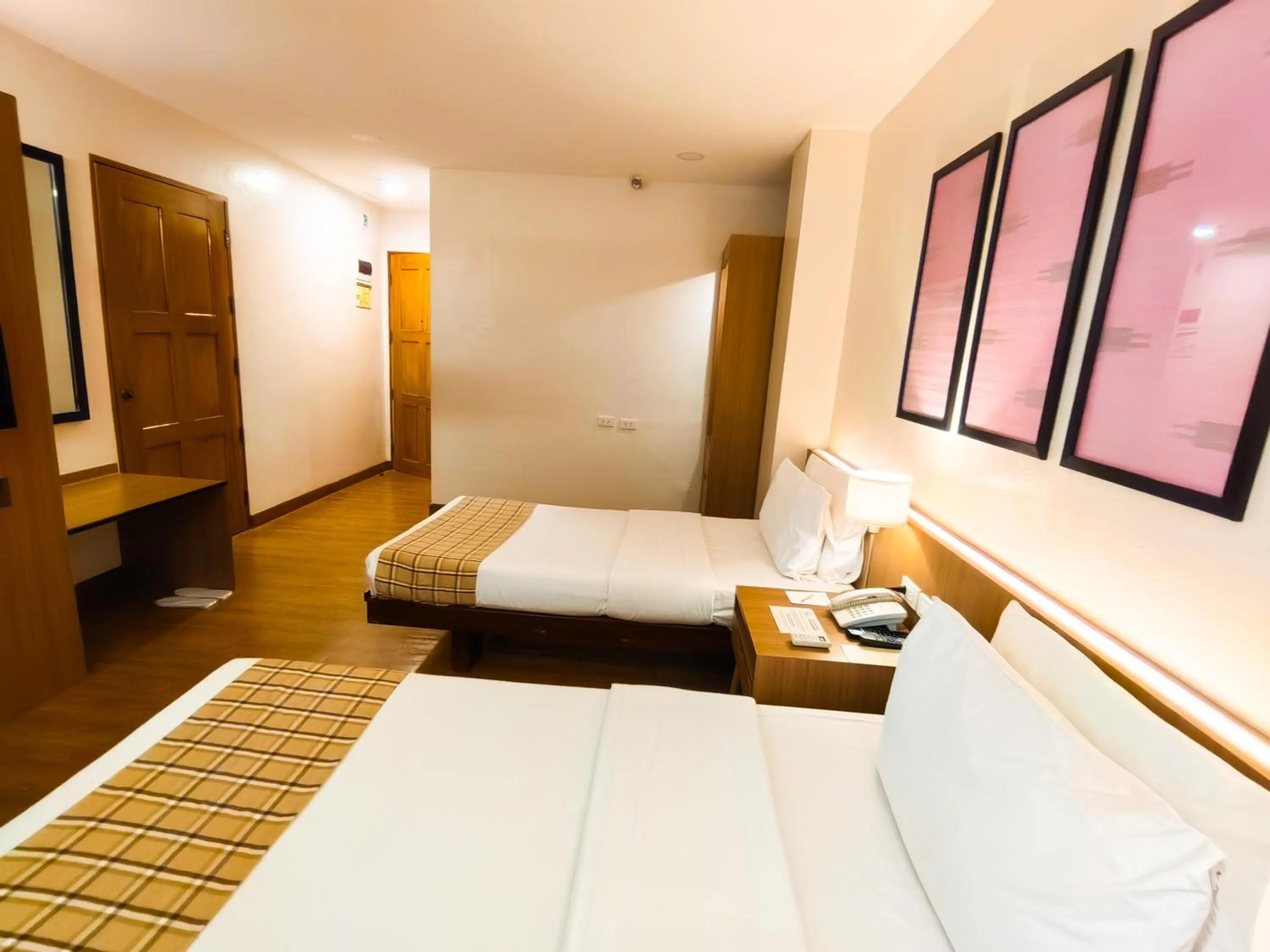 Bed in Nature's Village Resort