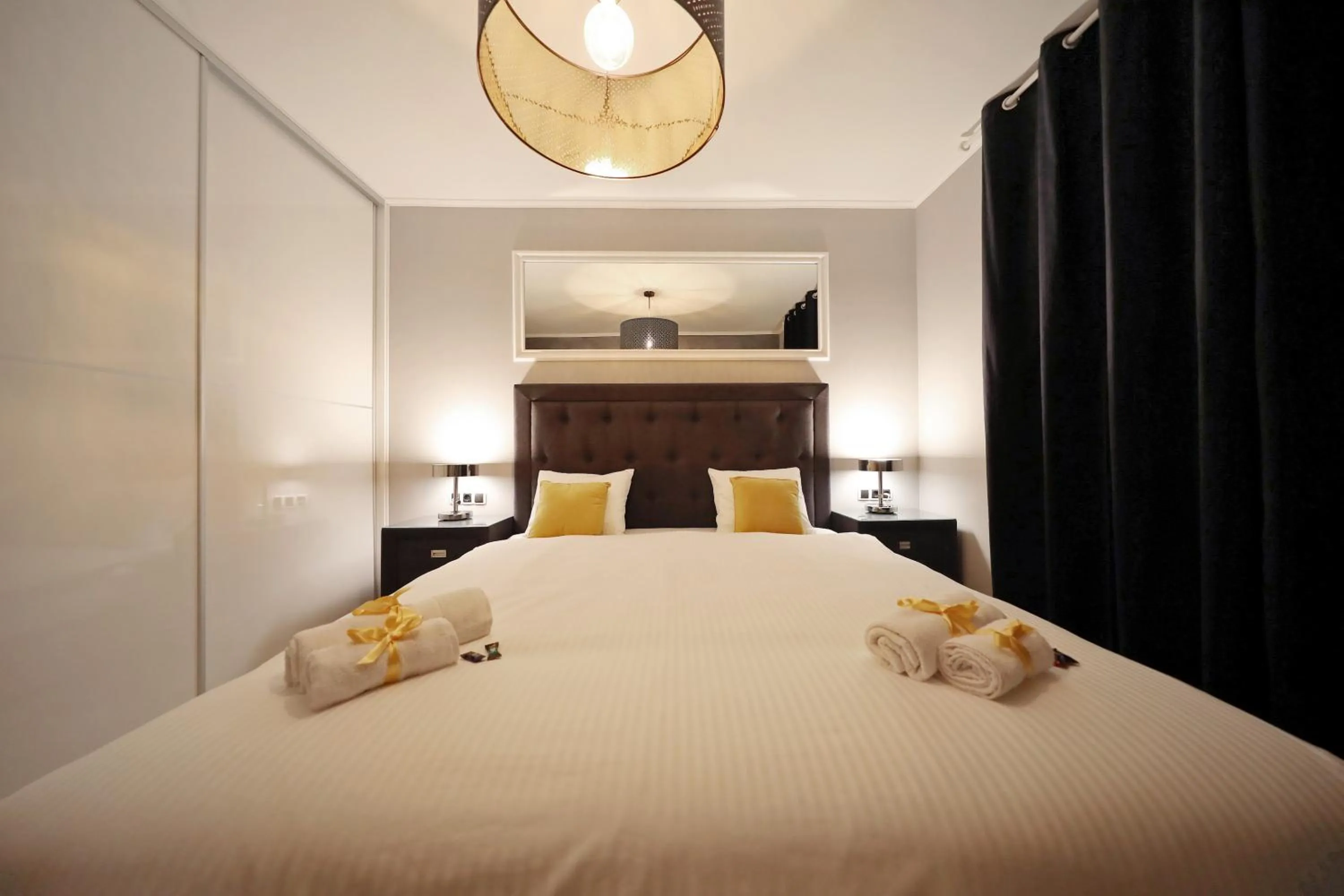 Bed in City Marine Luxury Apartments