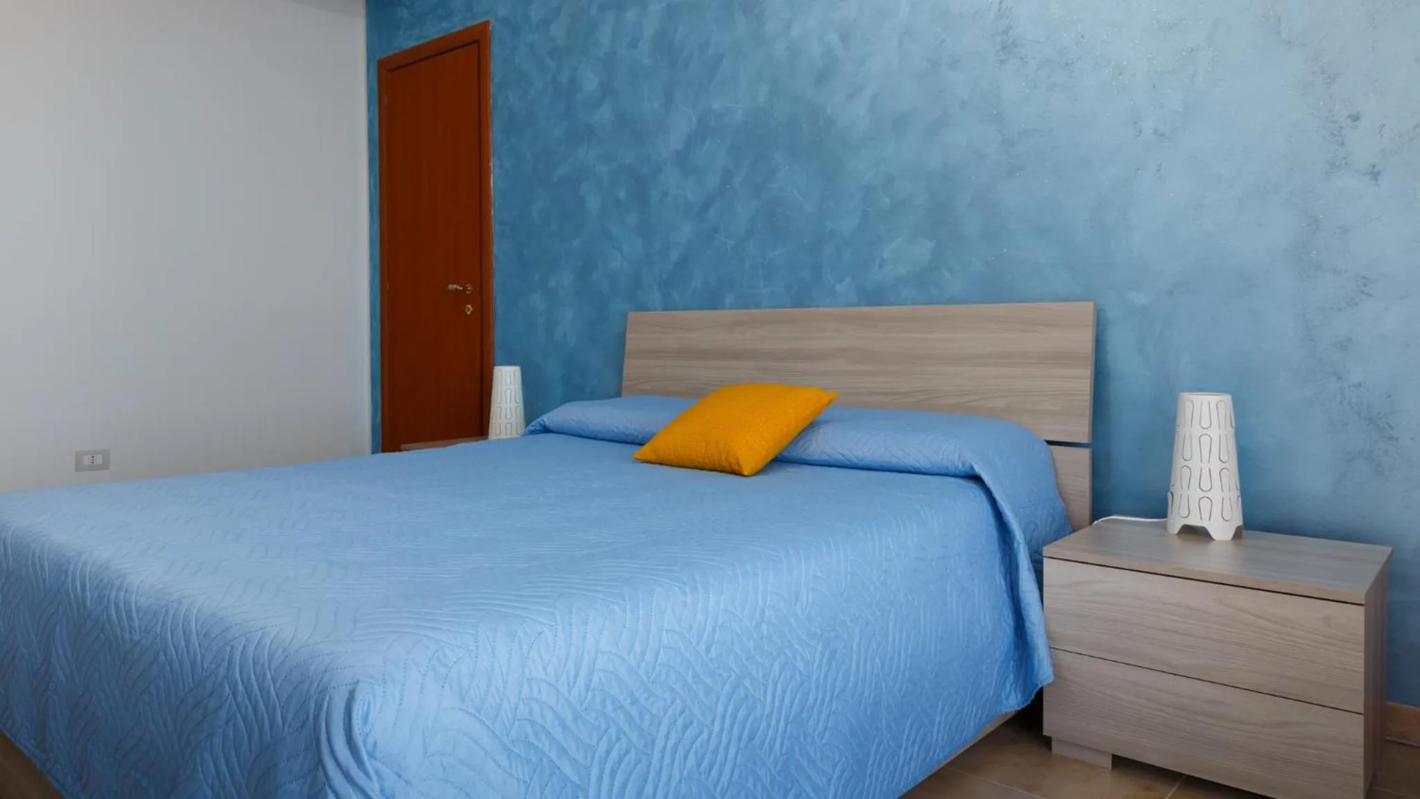 Bed in B&B Mediterraneo