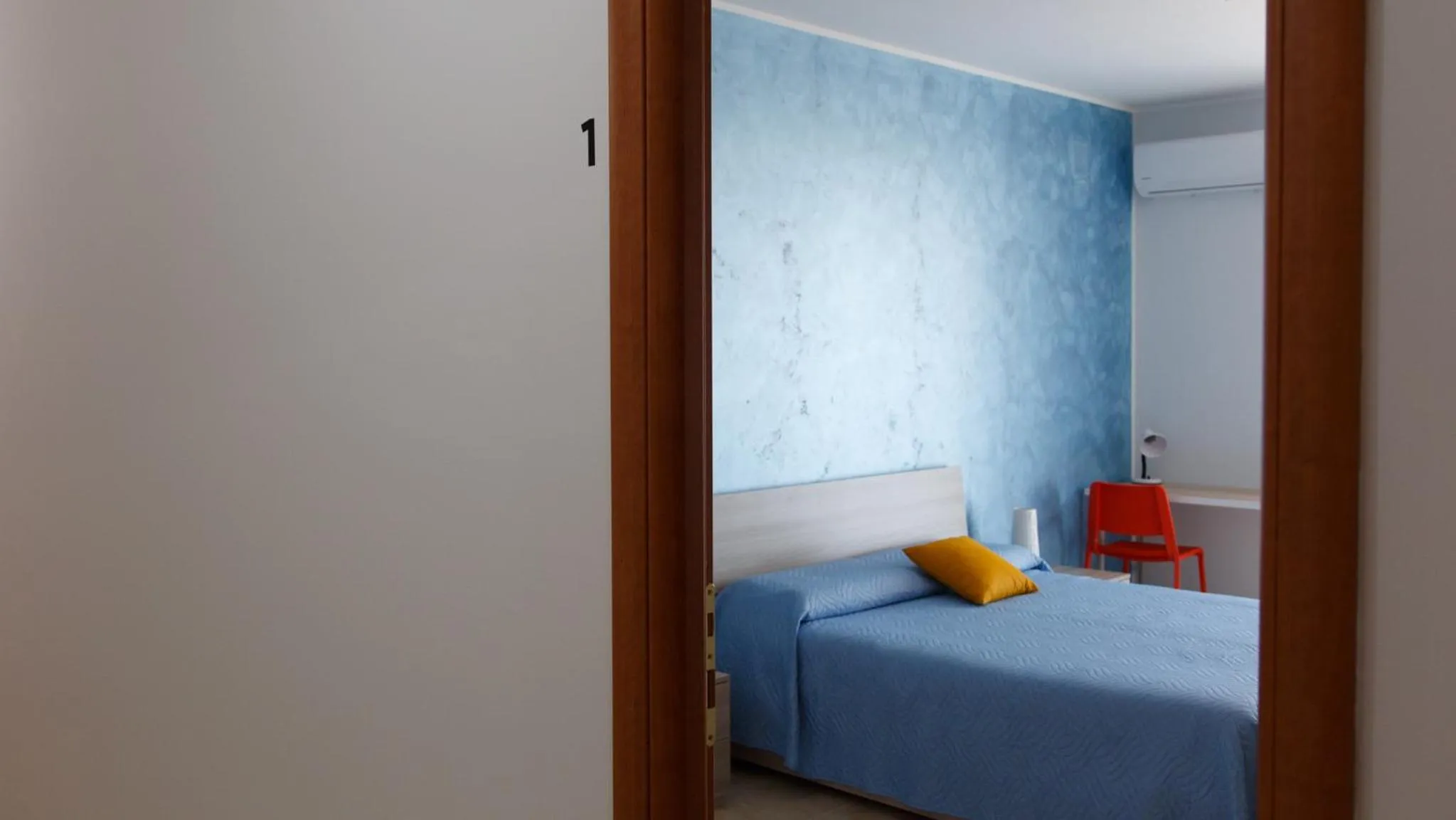 Bed in B&B Mediterraneo