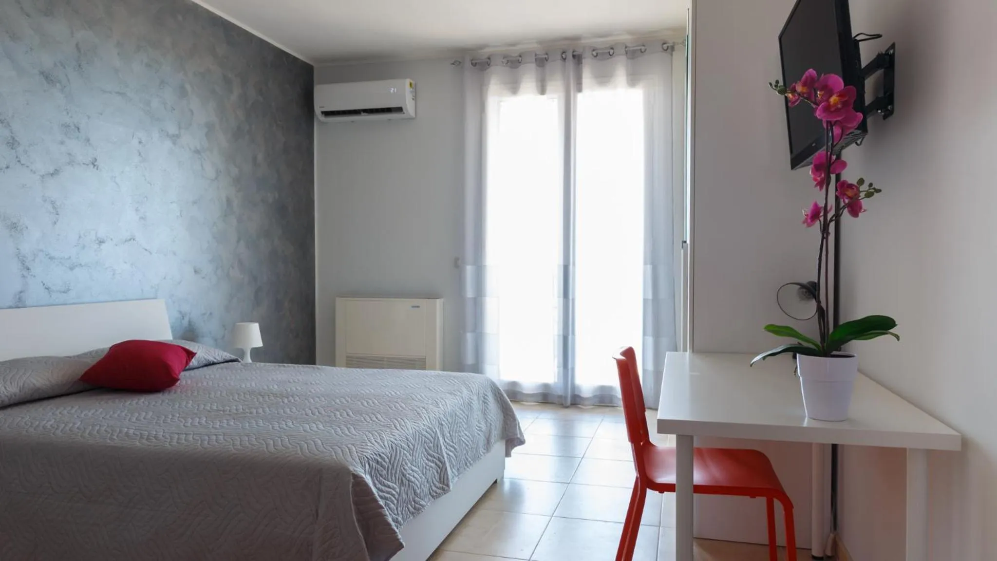 Bed in B&B Mediterraneo