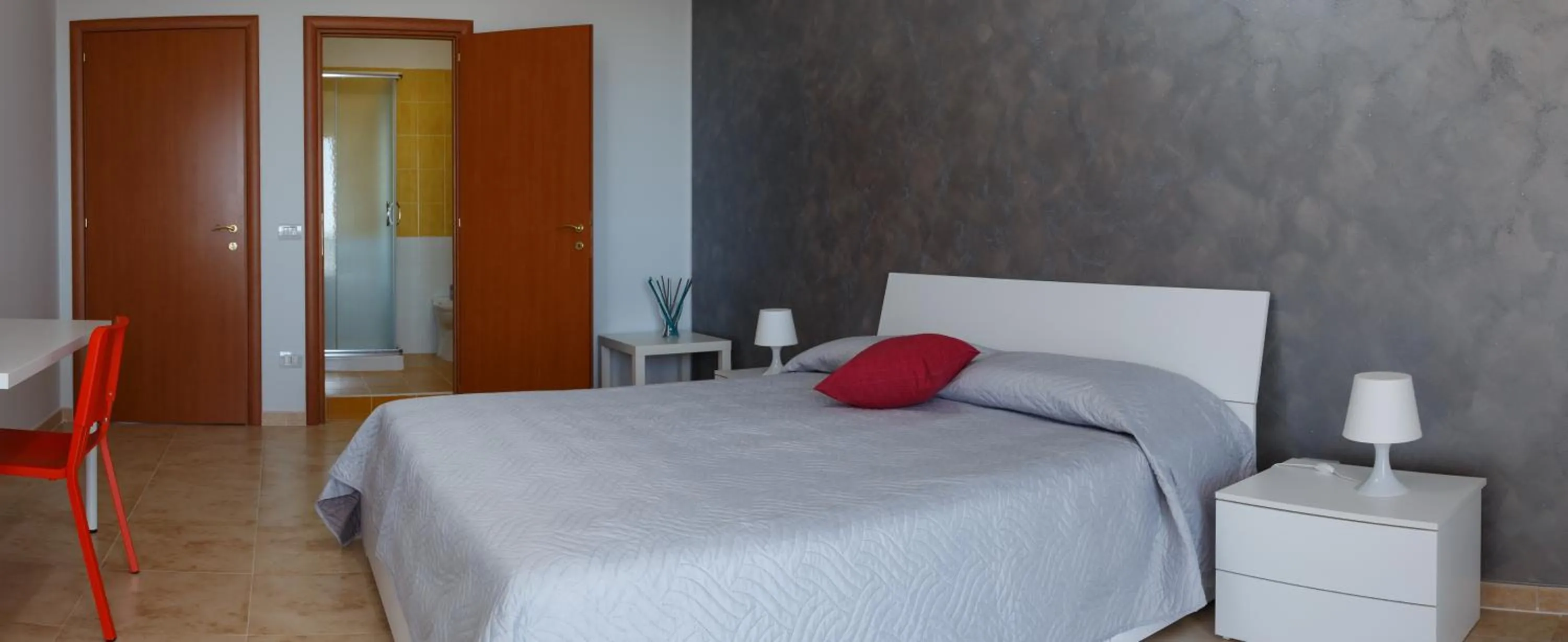 Bed in B&B Mediterraneo