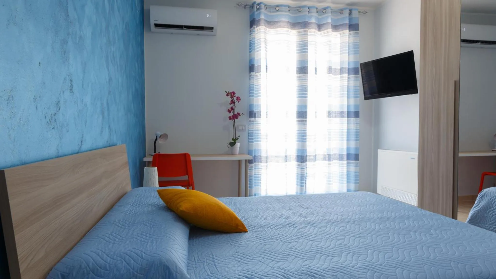 Bed in B&B Mediterraneo