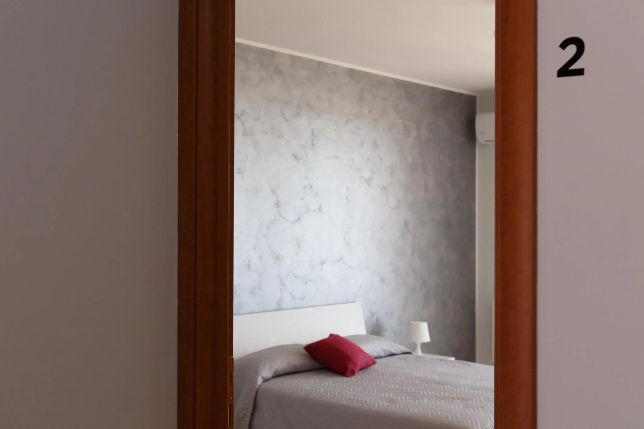 Bed in B&B Mediterraneo