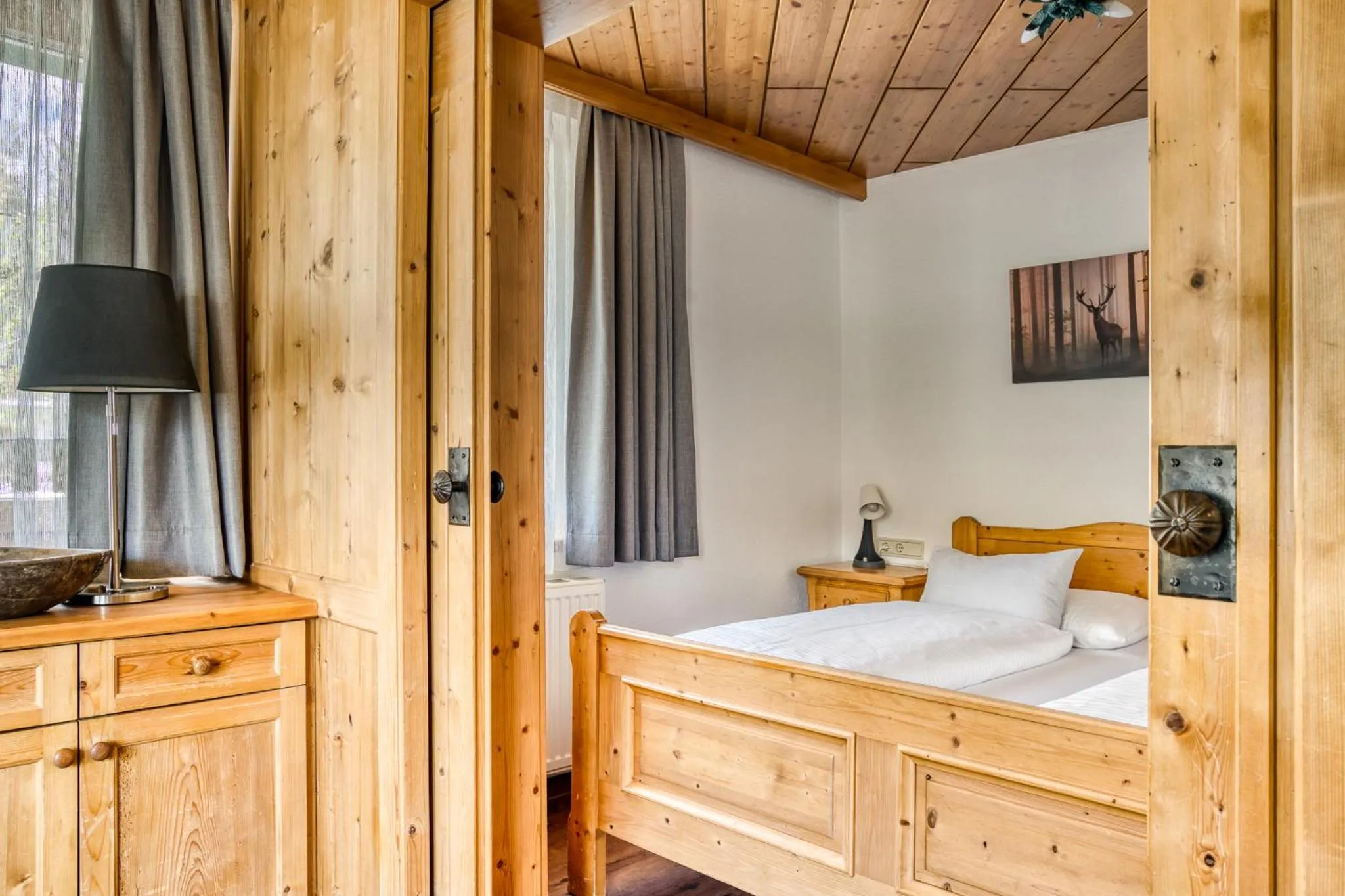 Photo of the whole room, Bed in Boutiquehotel ZOMM in Seefeld