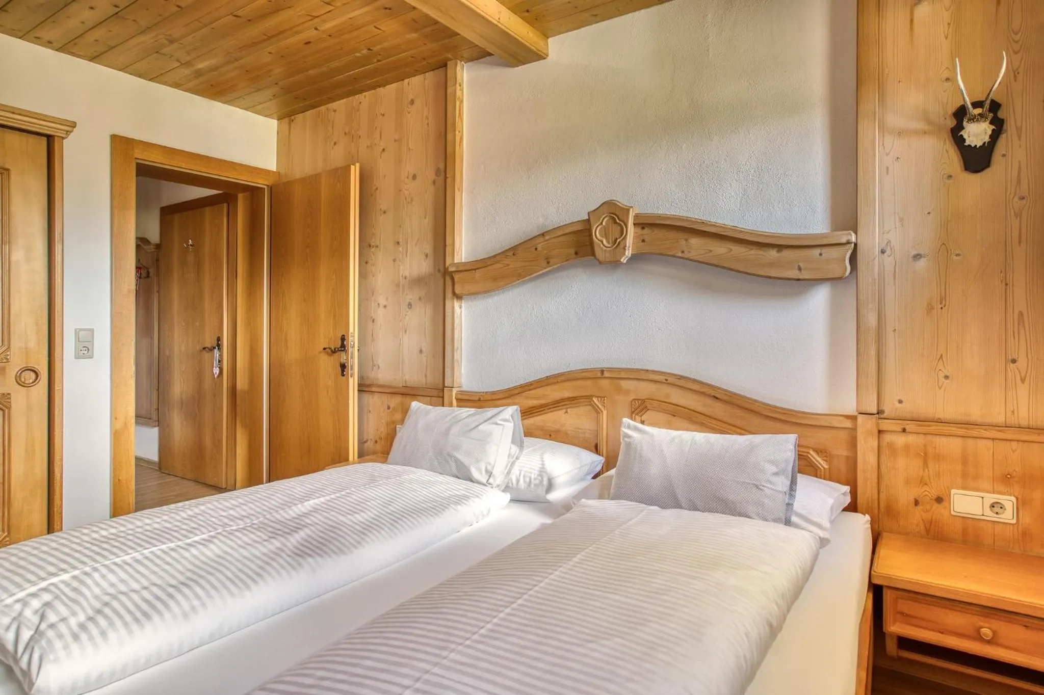 Bed in Boutiquehotel ZOMM in Seefeld