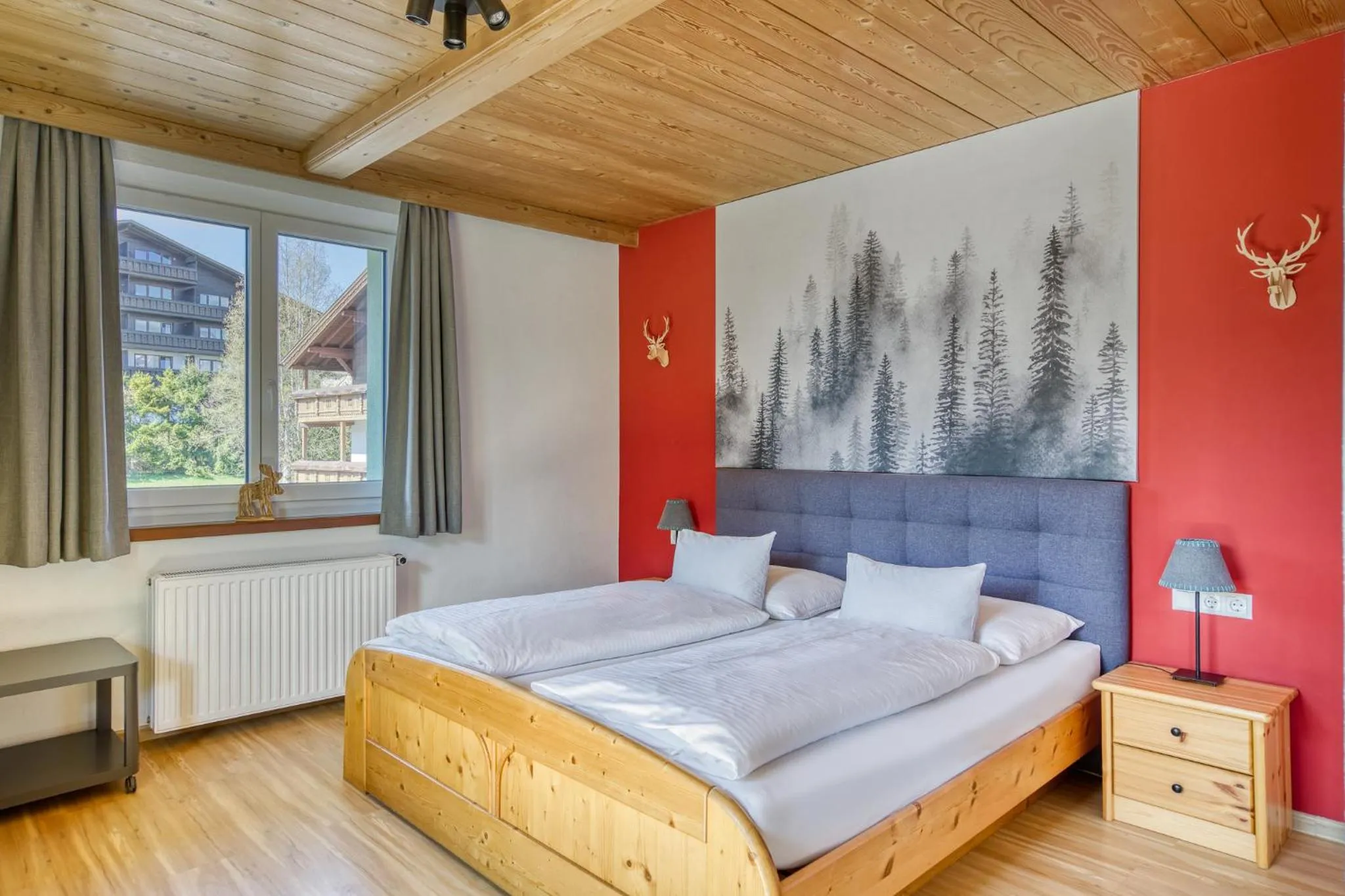 Photo of the whole room, Bed in Boutiquehotel ZOMM in Seefeld