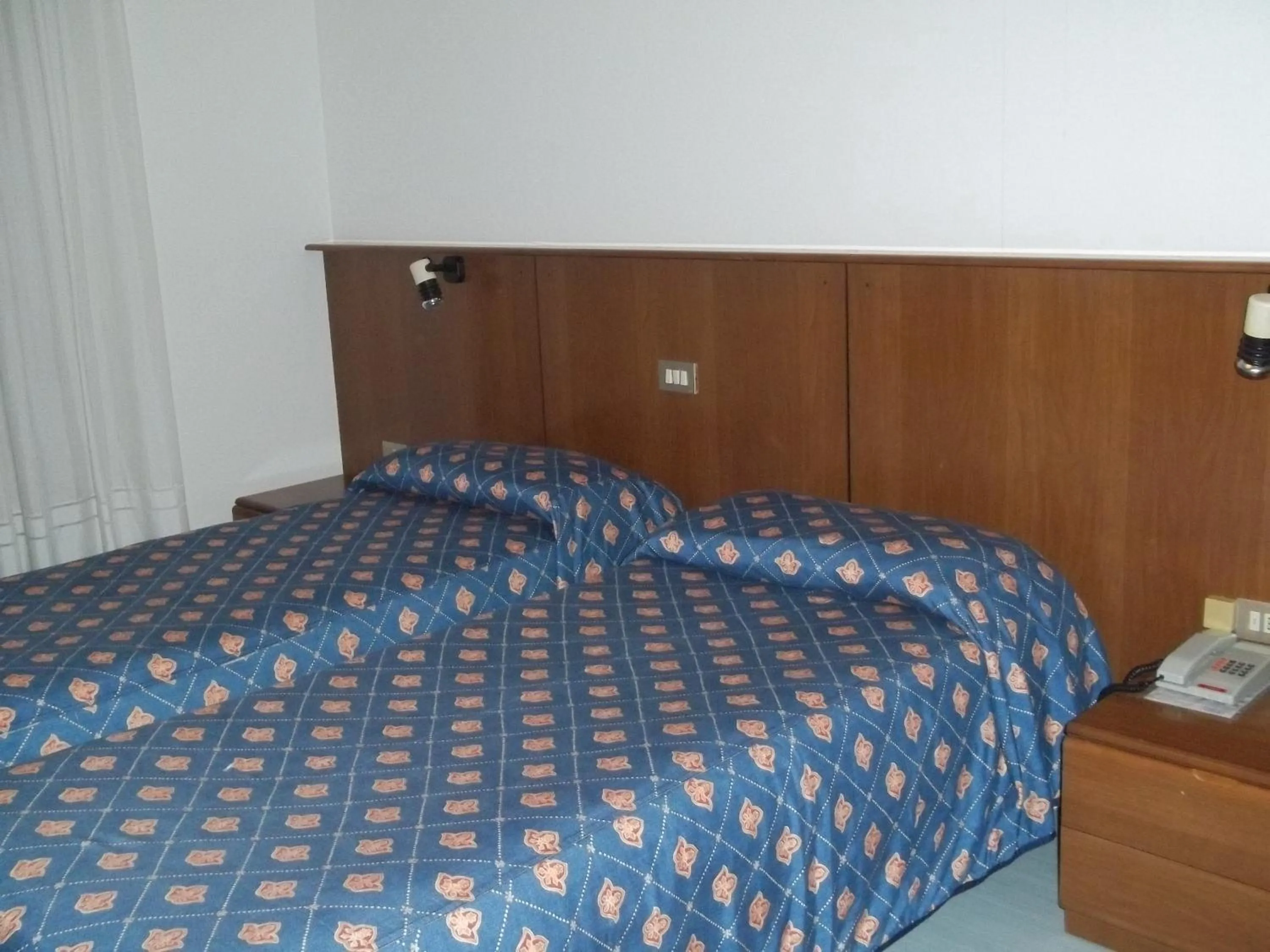 Bed in Hotel Palladio