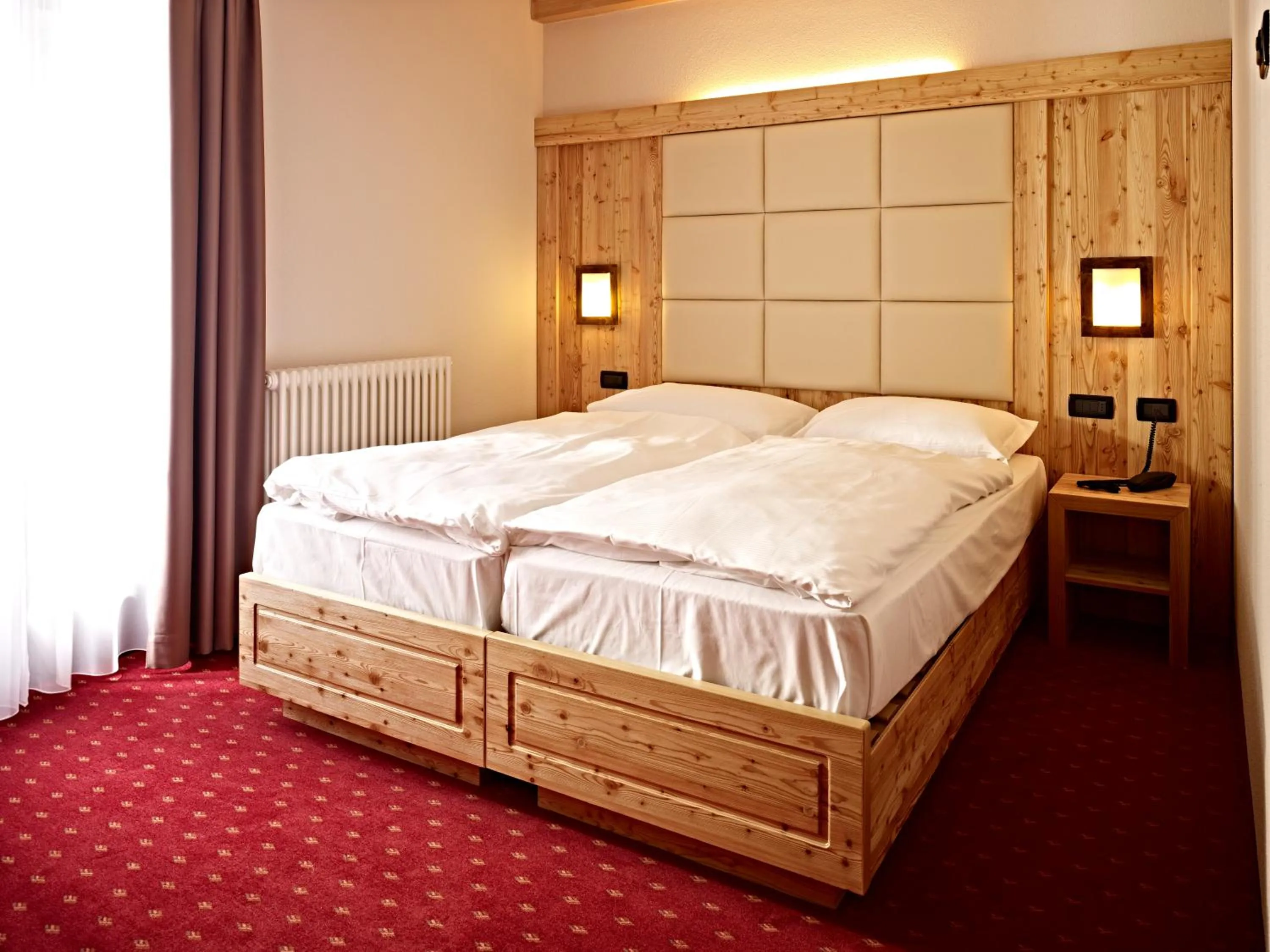 Bed in Hotel Garni My Ledro