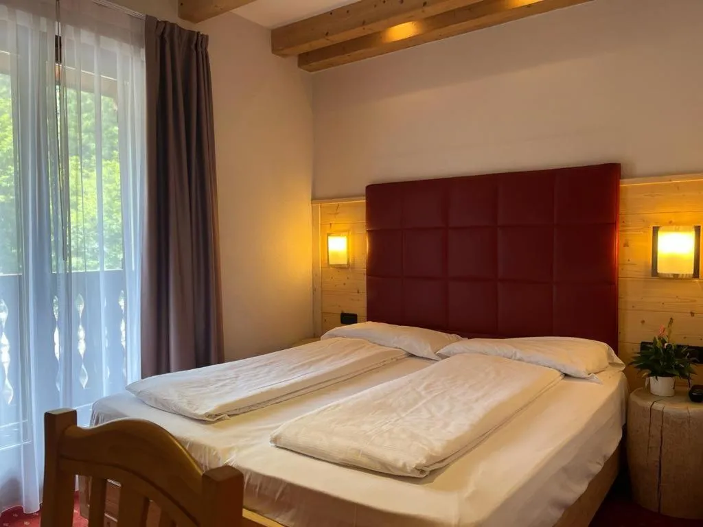 Bedroom, Bed in Hotel Garni My Ledro