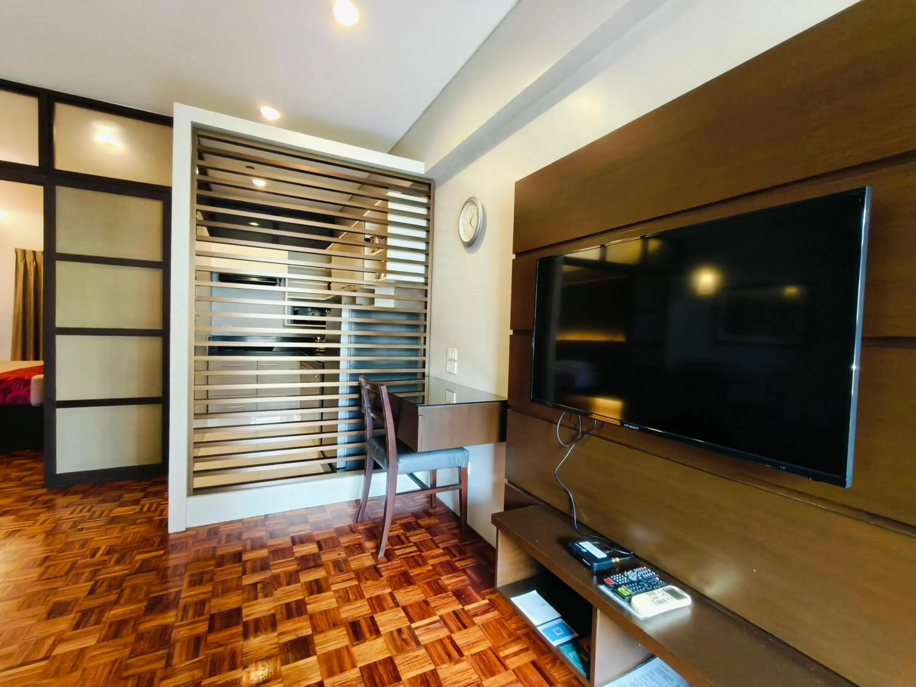 Bed in Tropicana Suites