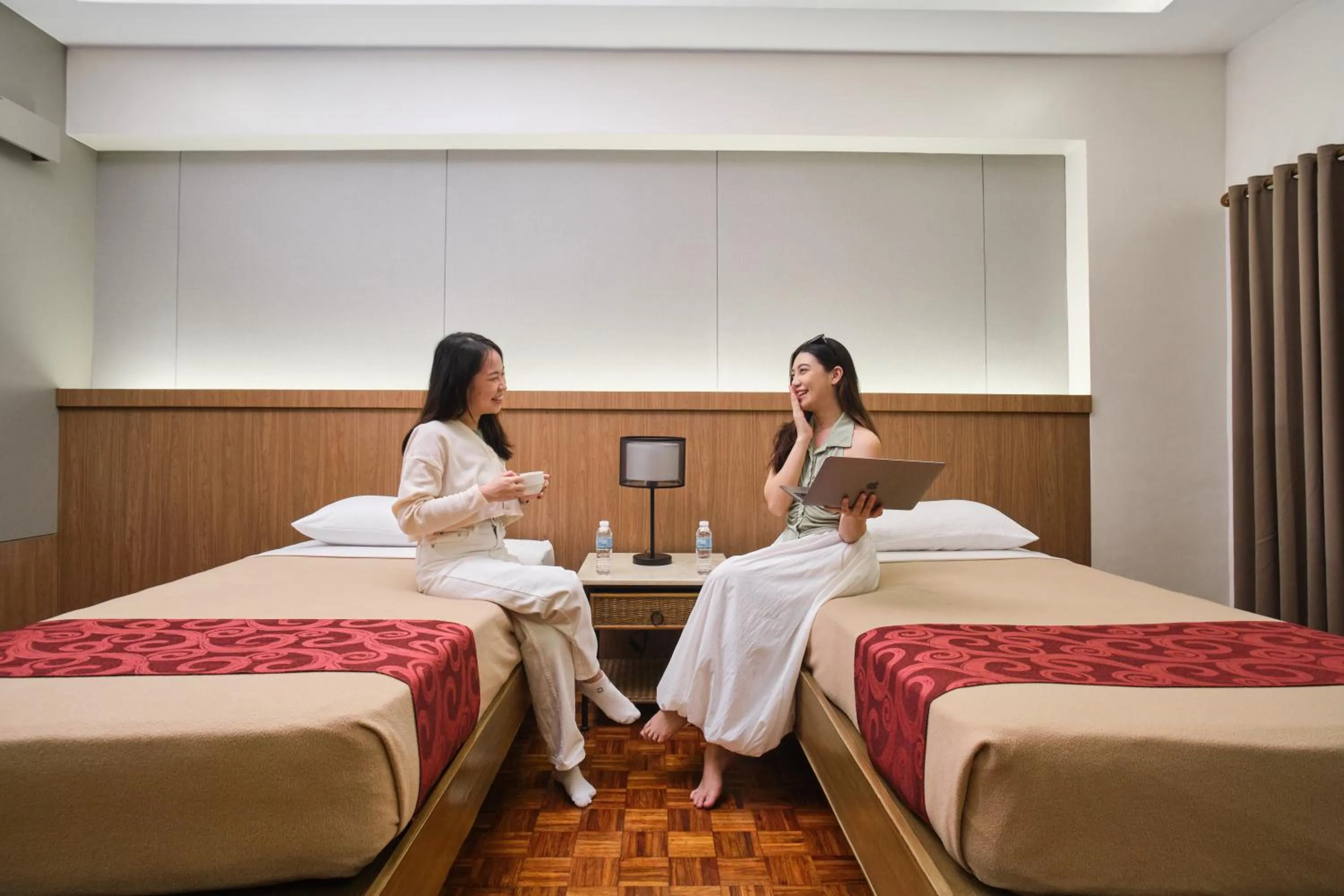 Bed in Tropicana Suites