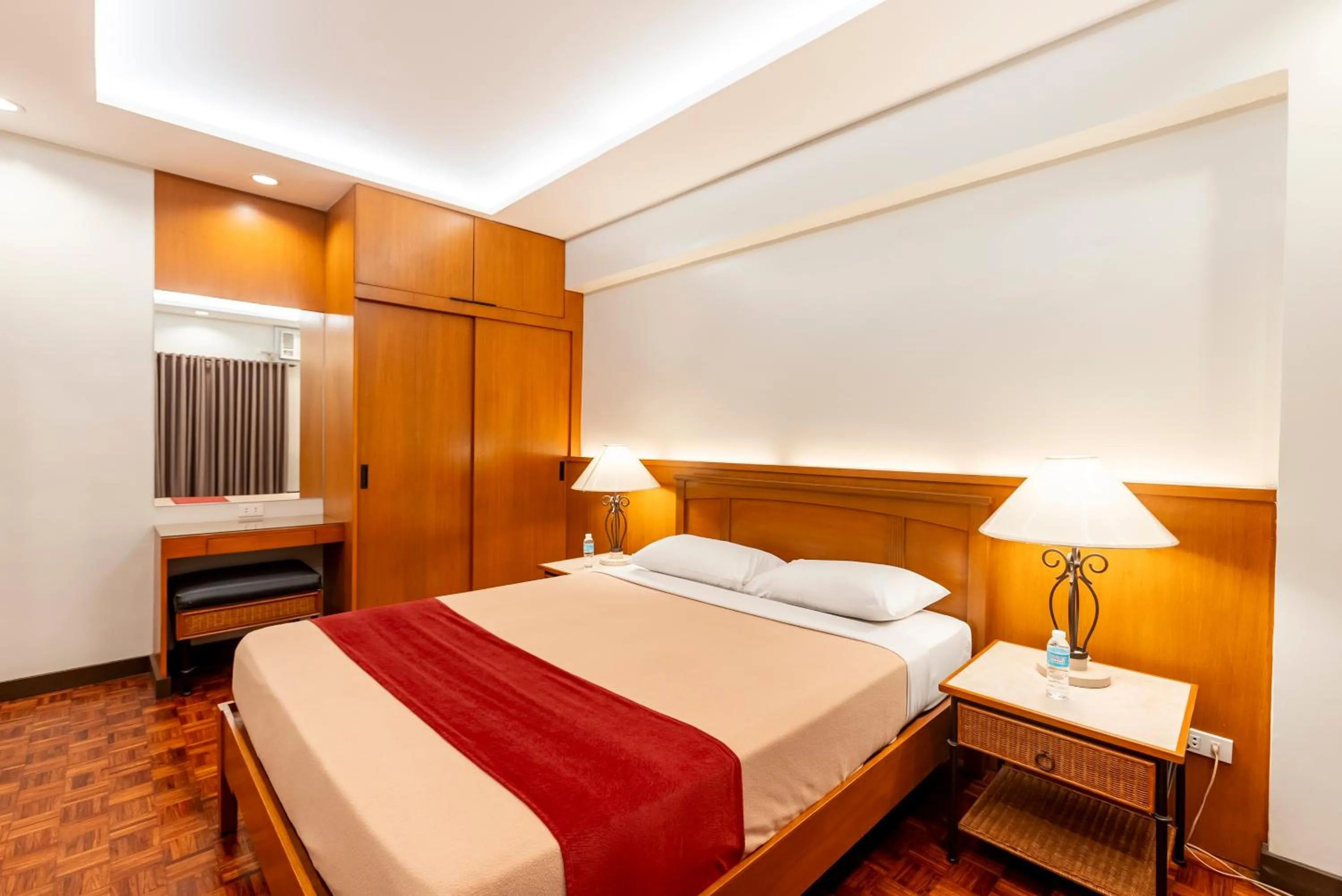 Bed in Tropicana Suites