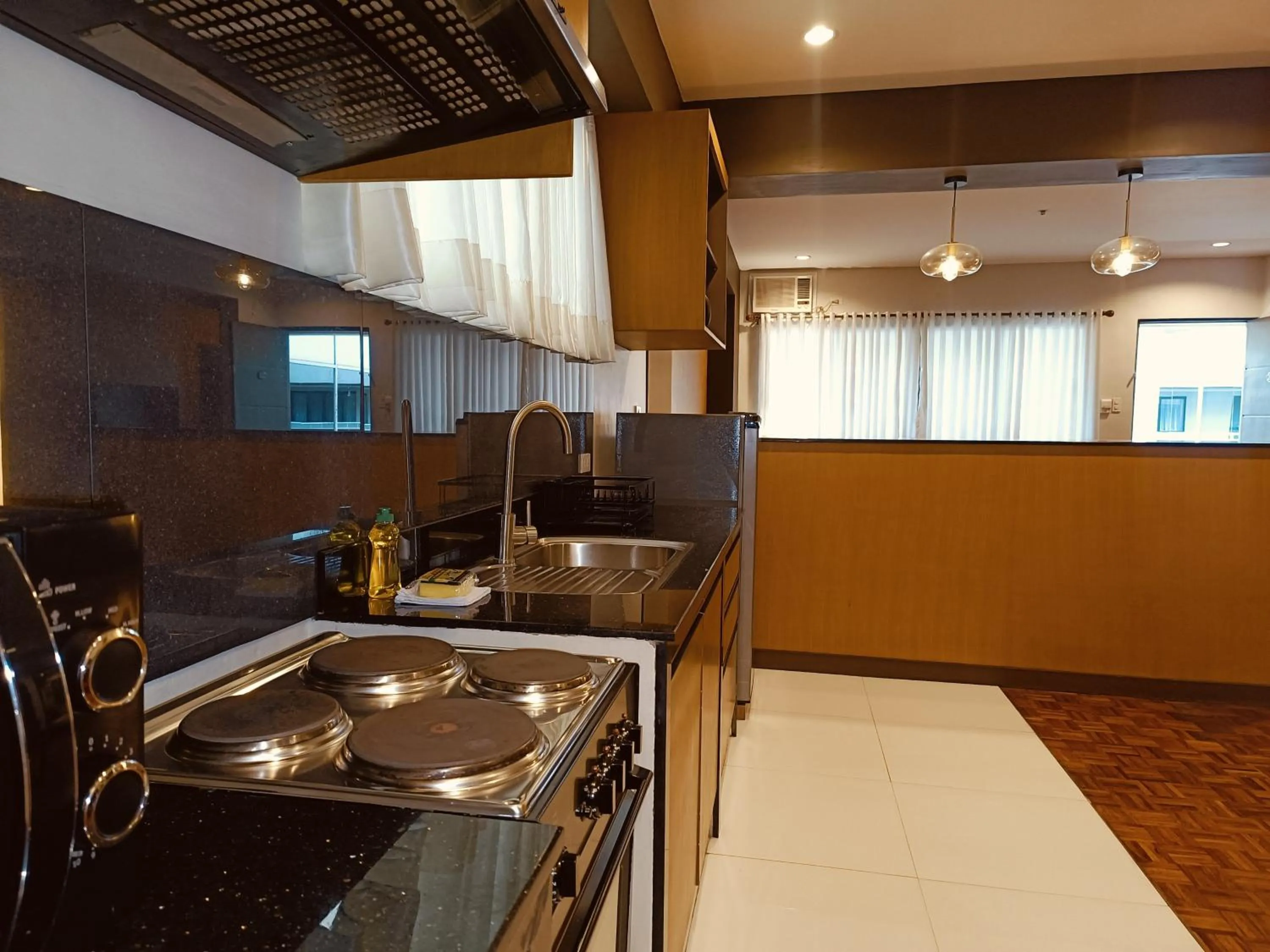 Kitchen or kitchenette in Tropicana Suites