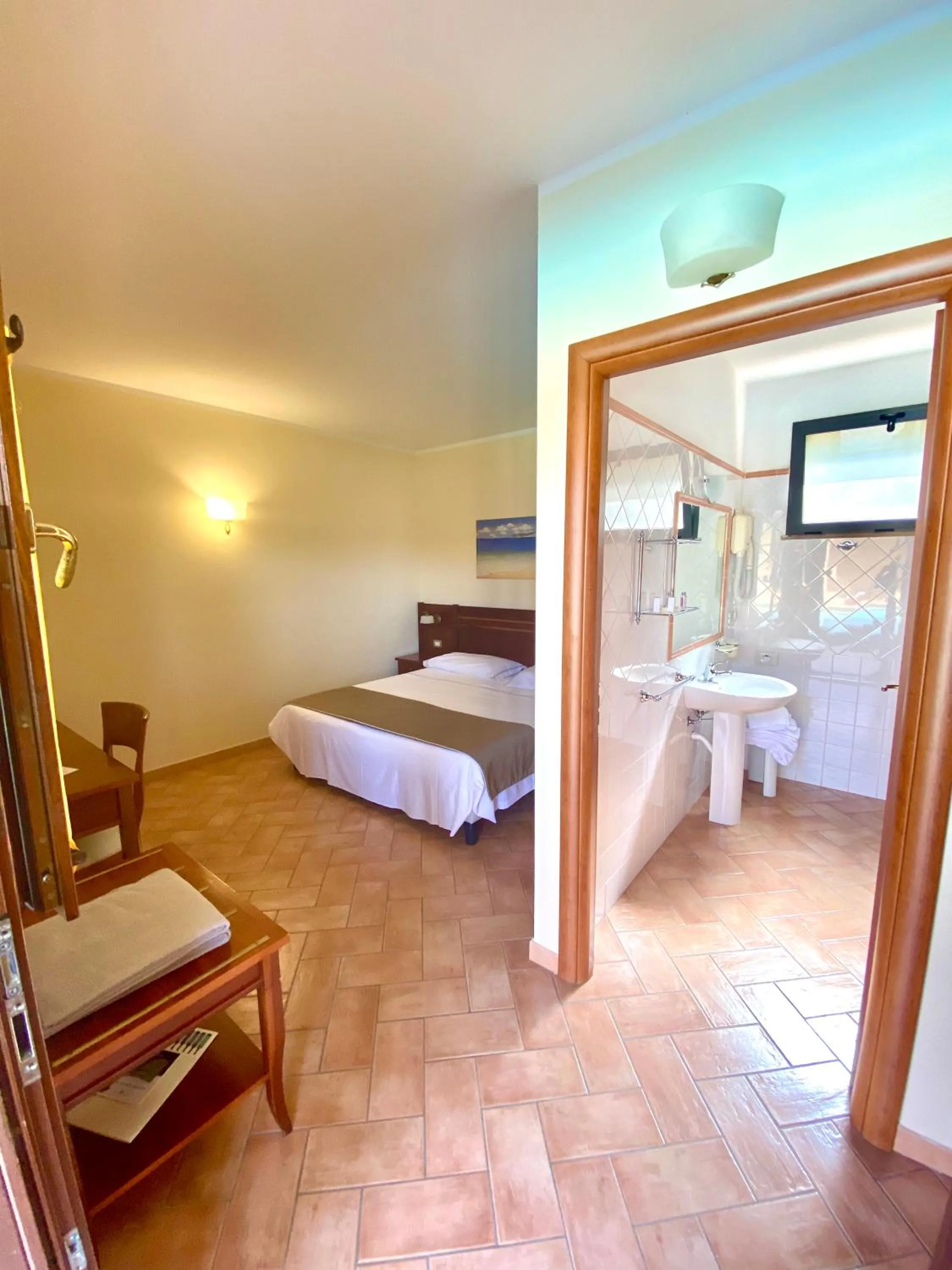 Photo of the whole room, Bed in Hotel Ristorante Le Querciolaie dei Ricci