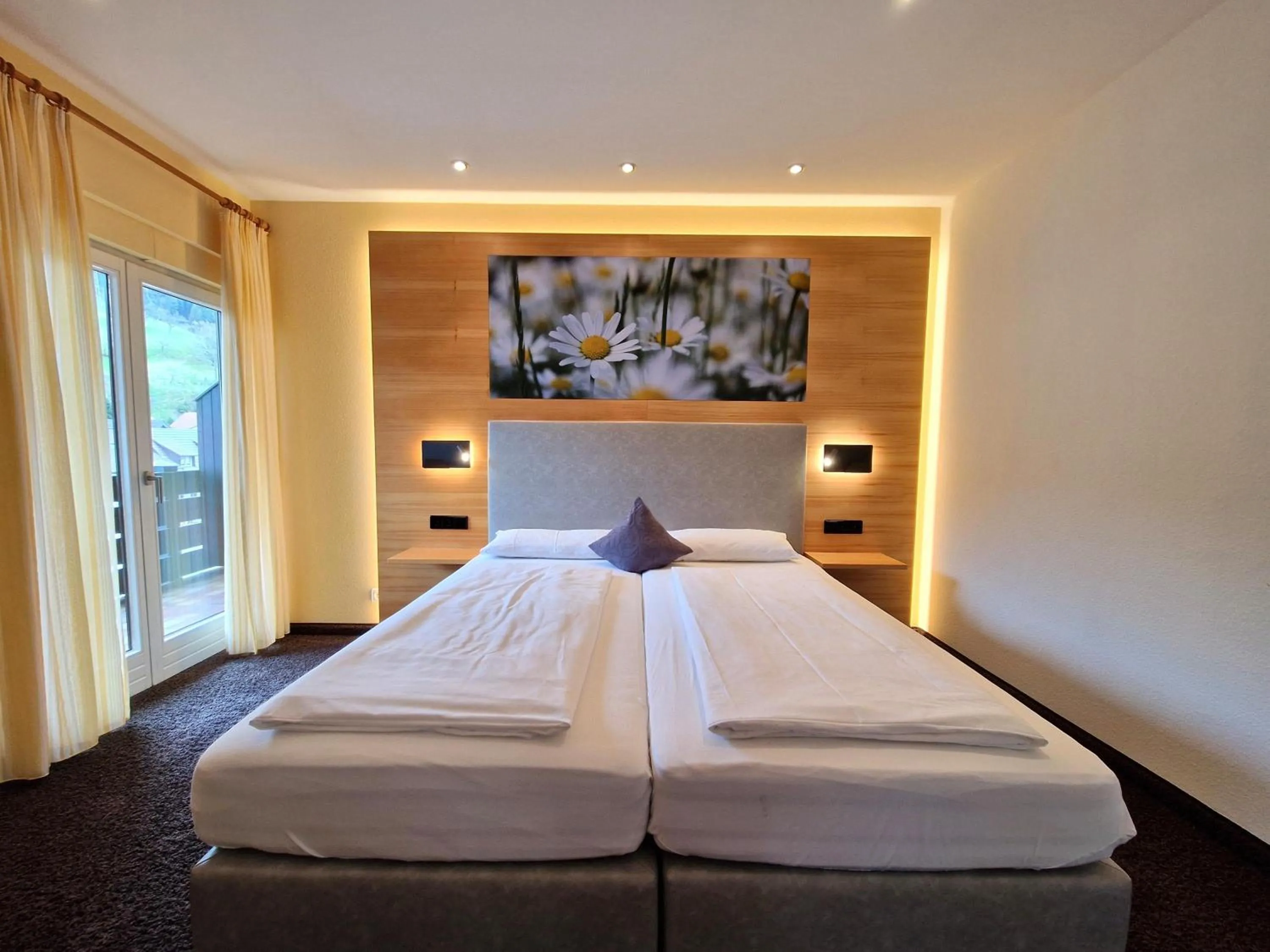 Bed in Mosers Blume Relax & Genuss Hotel