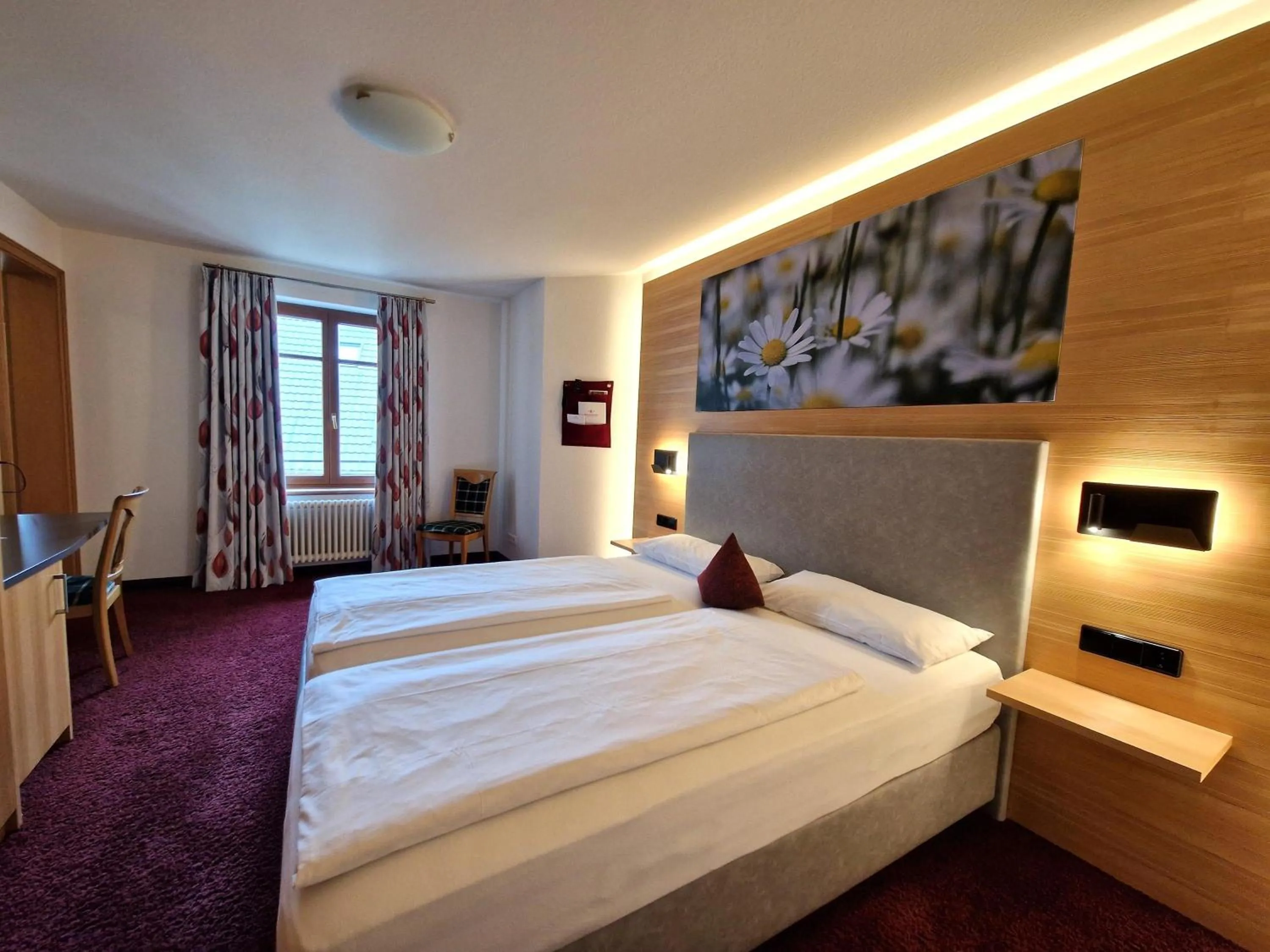 Bed in Mosers Blume Relax & Genuss Hotel