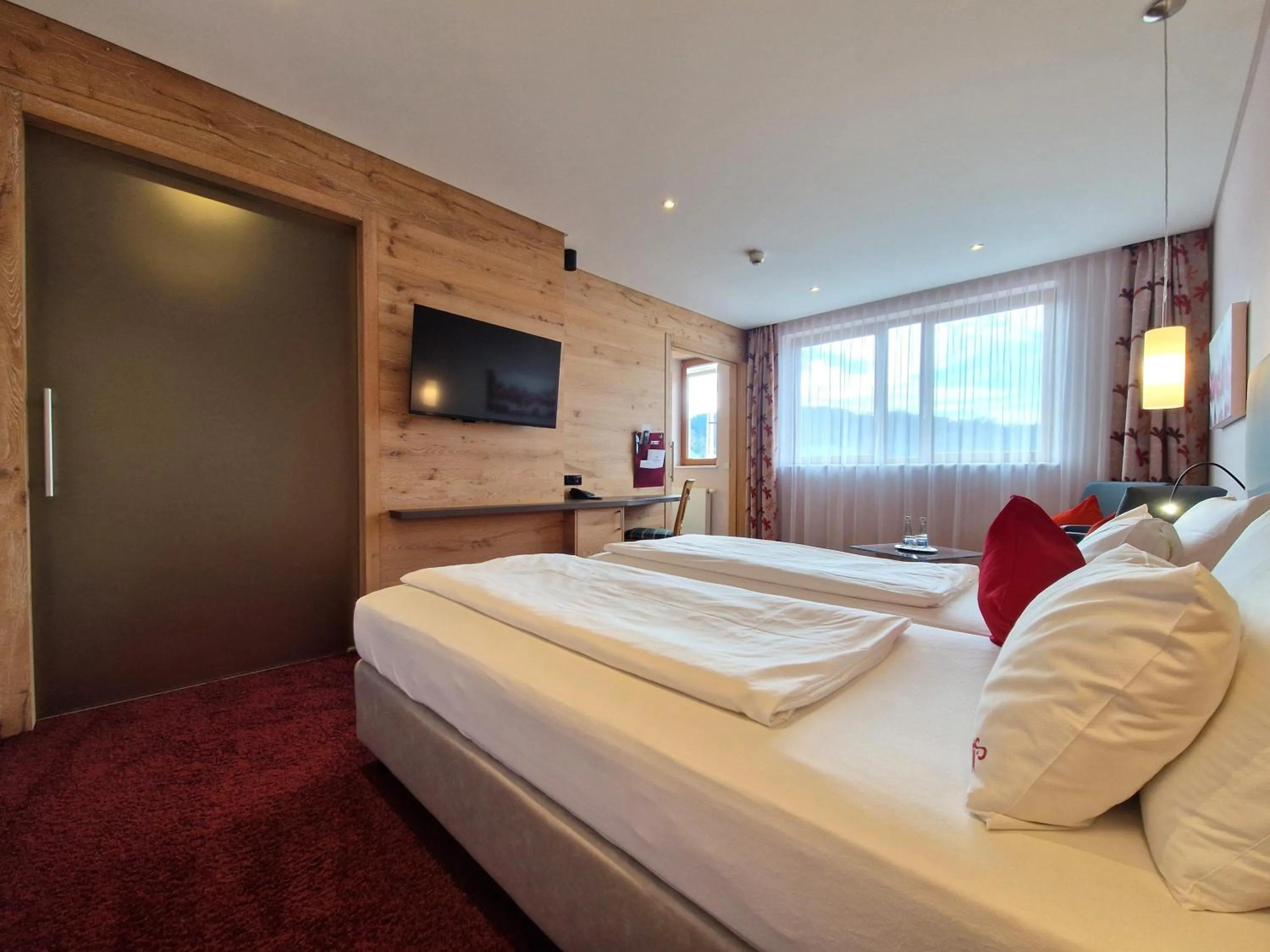 Bed in Mosers Blume Relax & Genuss Hotel