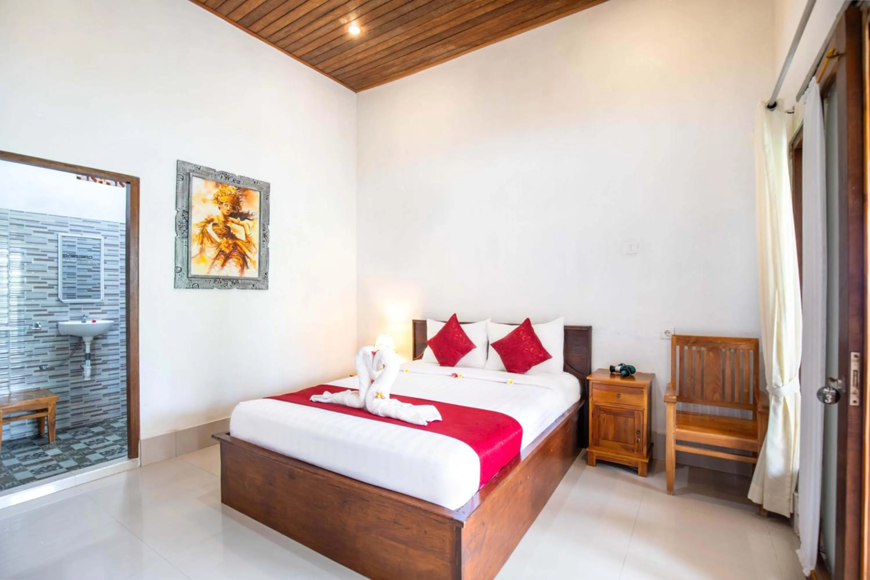 Bed in Swan Beach Inn