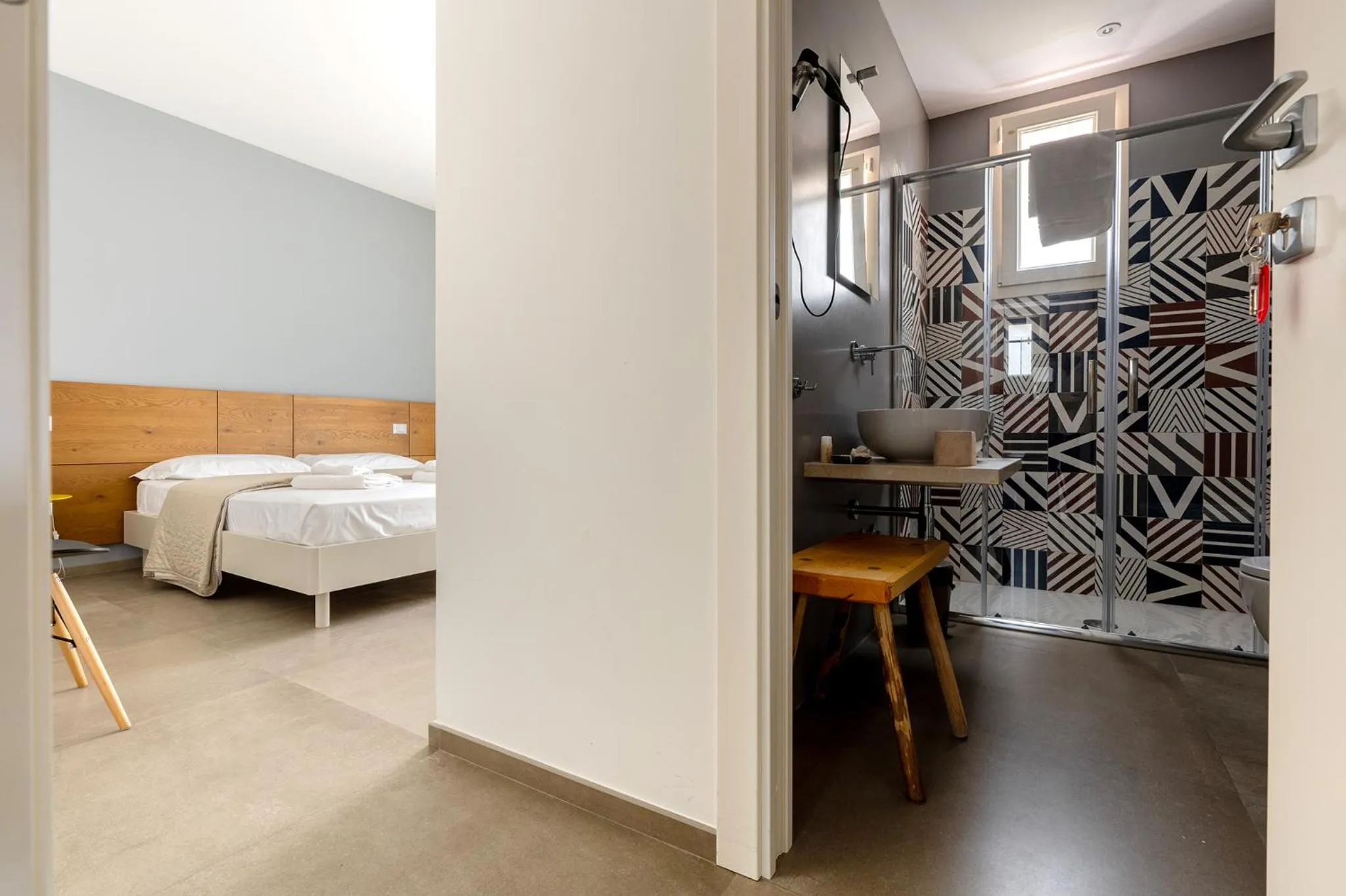 Bed in Serafini Rooms